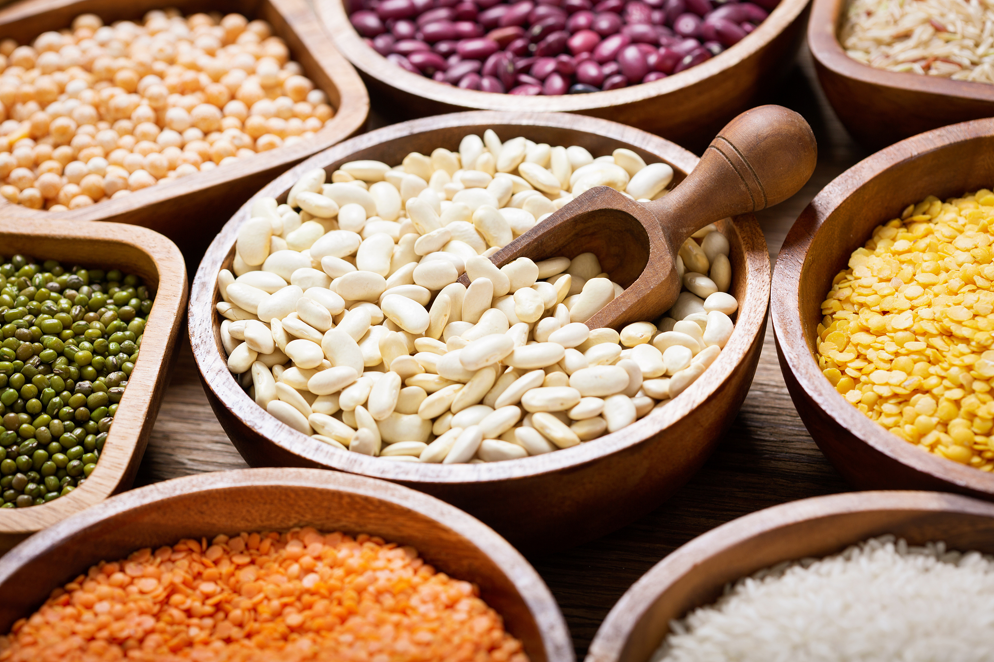 bowls of legumes, lentils, chickpeas, rice and beans