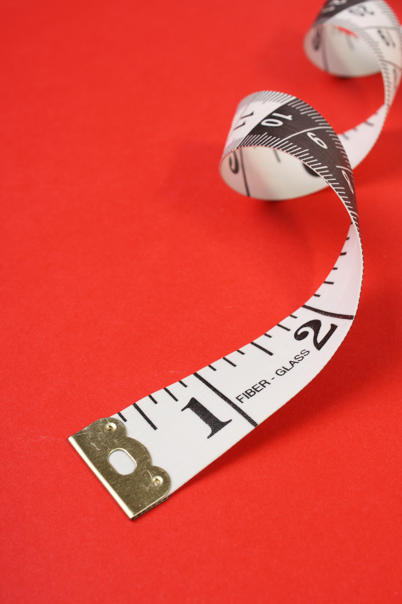 tape measure on red