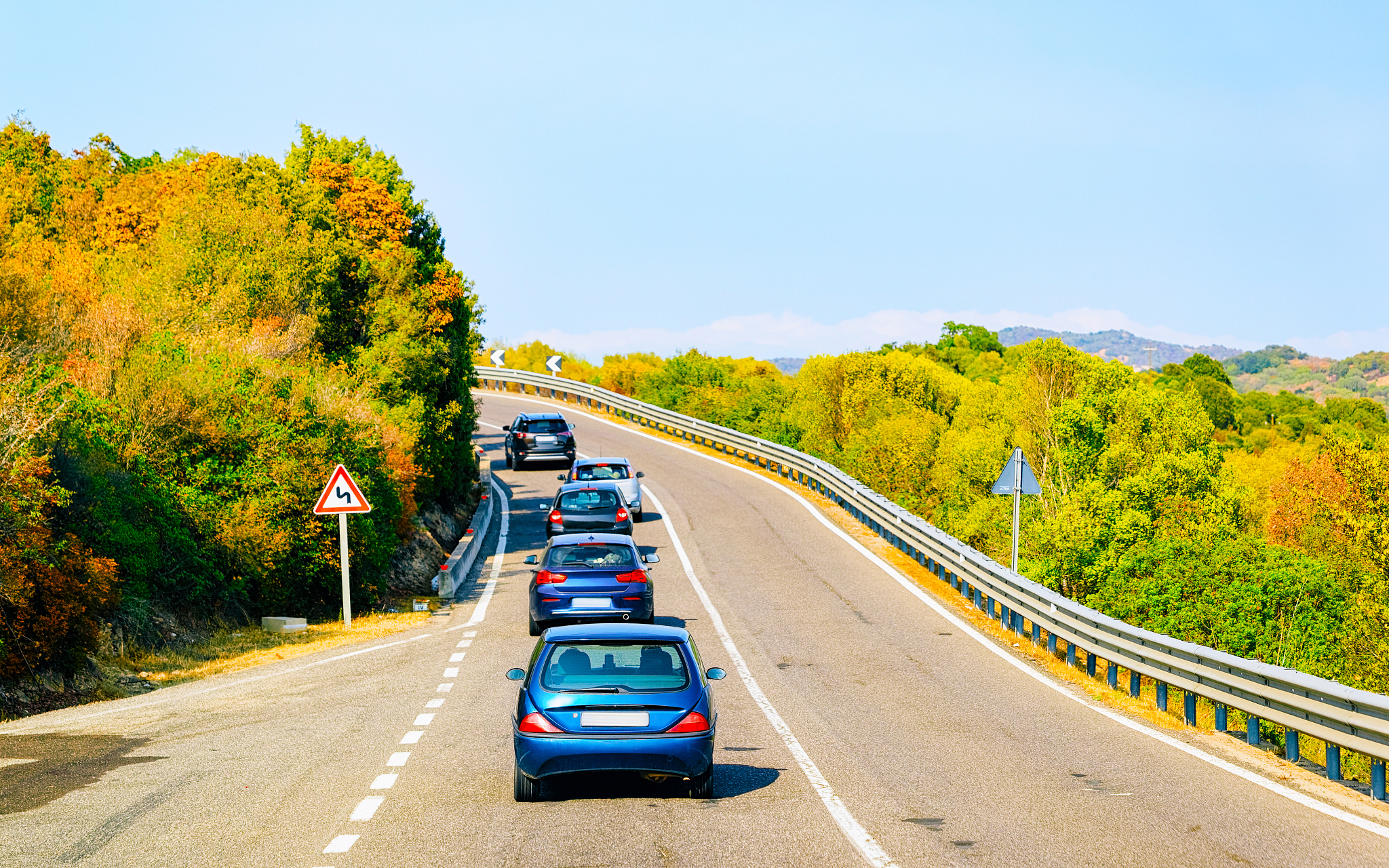 cars on road in costa smeralda in sardinia island reflex