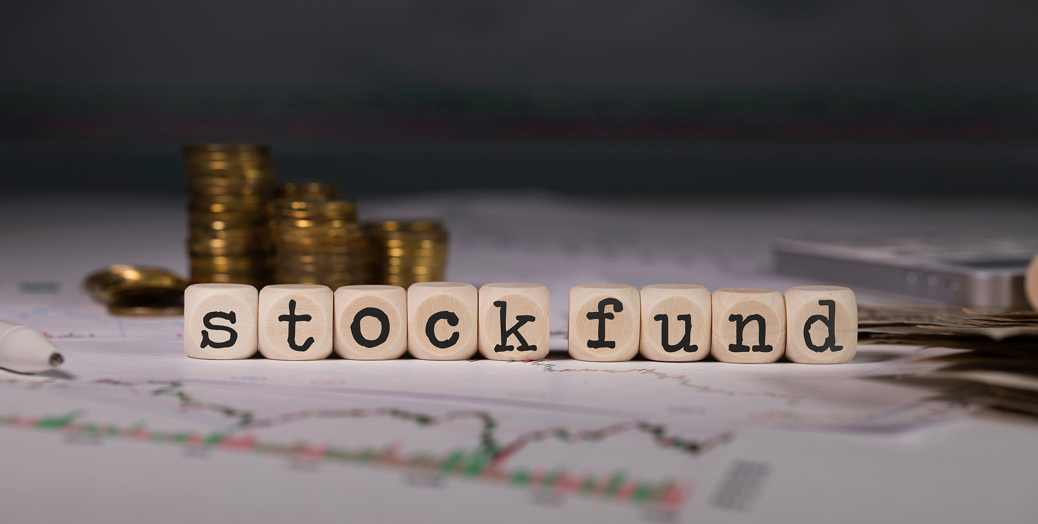 words stock fund composed of wooden letters.