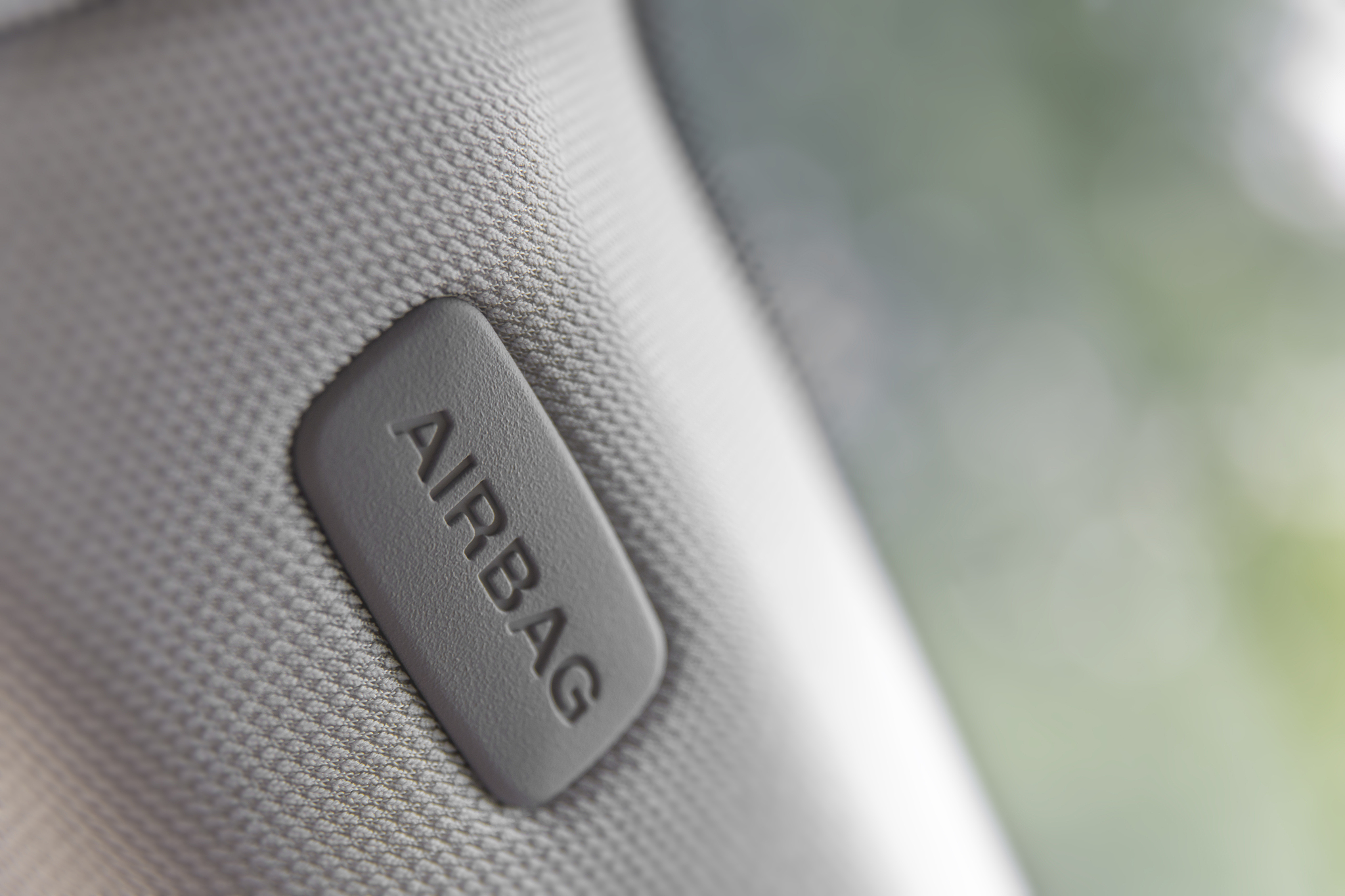 airbag sign on the side of door of the vehicle