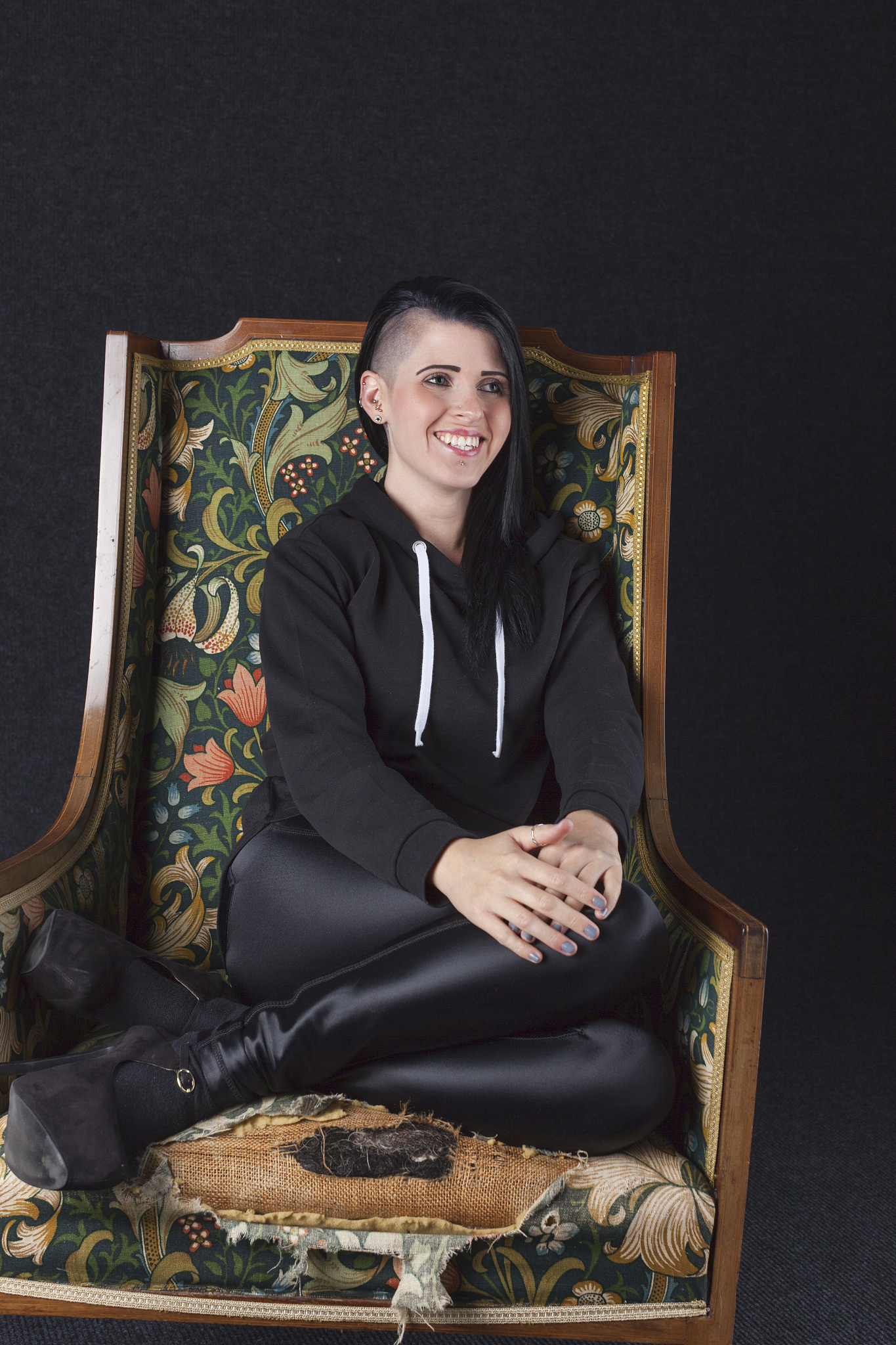 woman in an old armchair