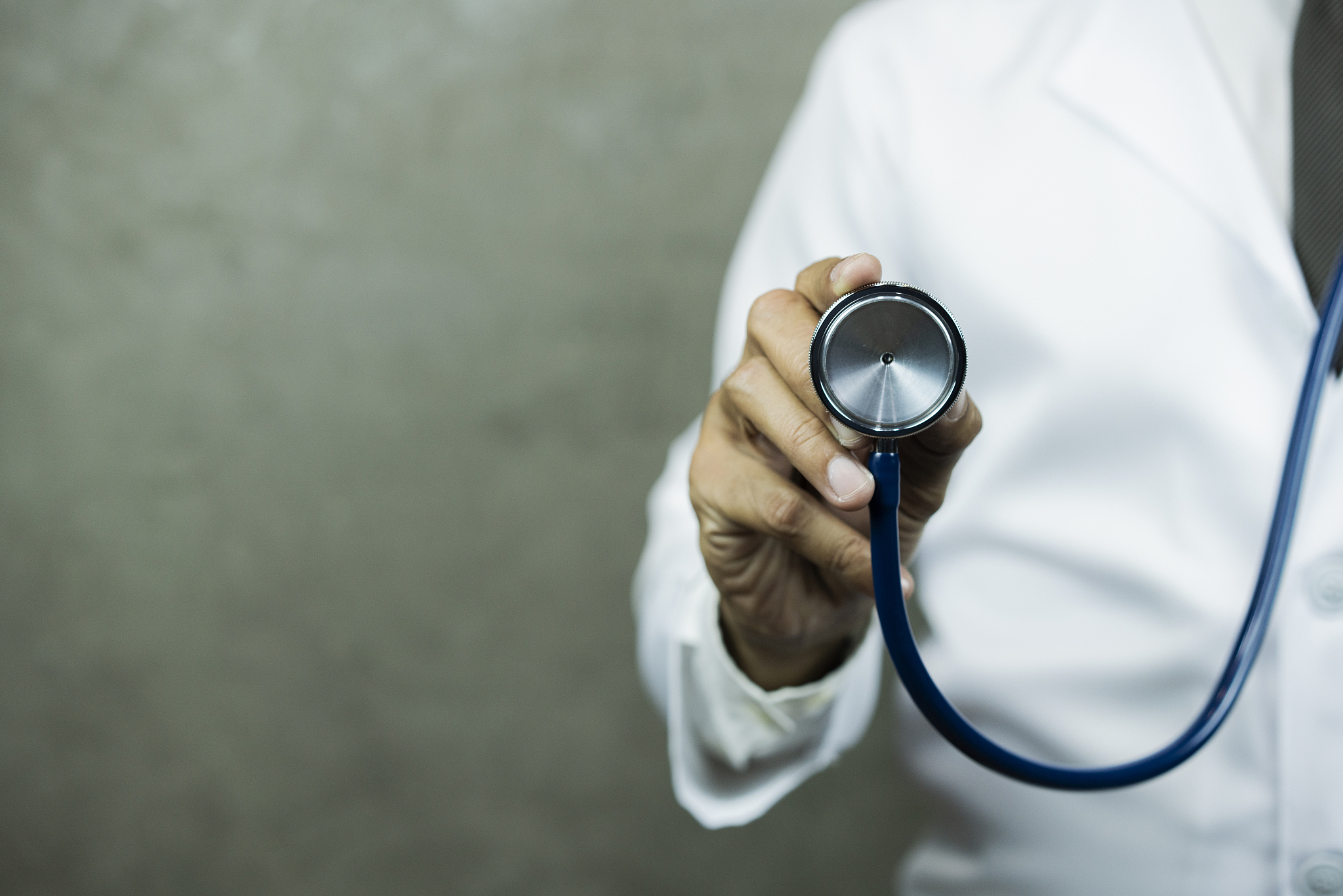 doctor using digital tablet
