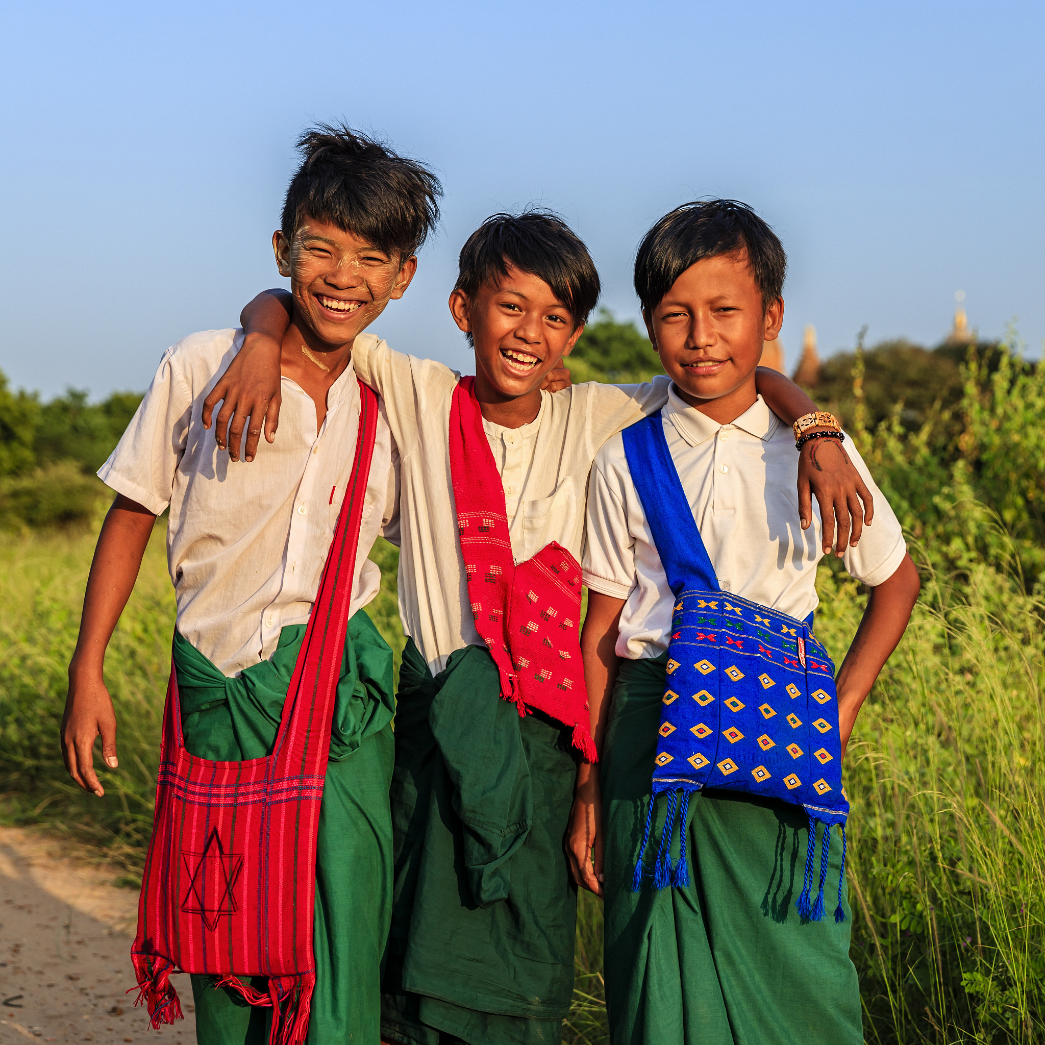 young burmese schoolboys in bagan, myanmar