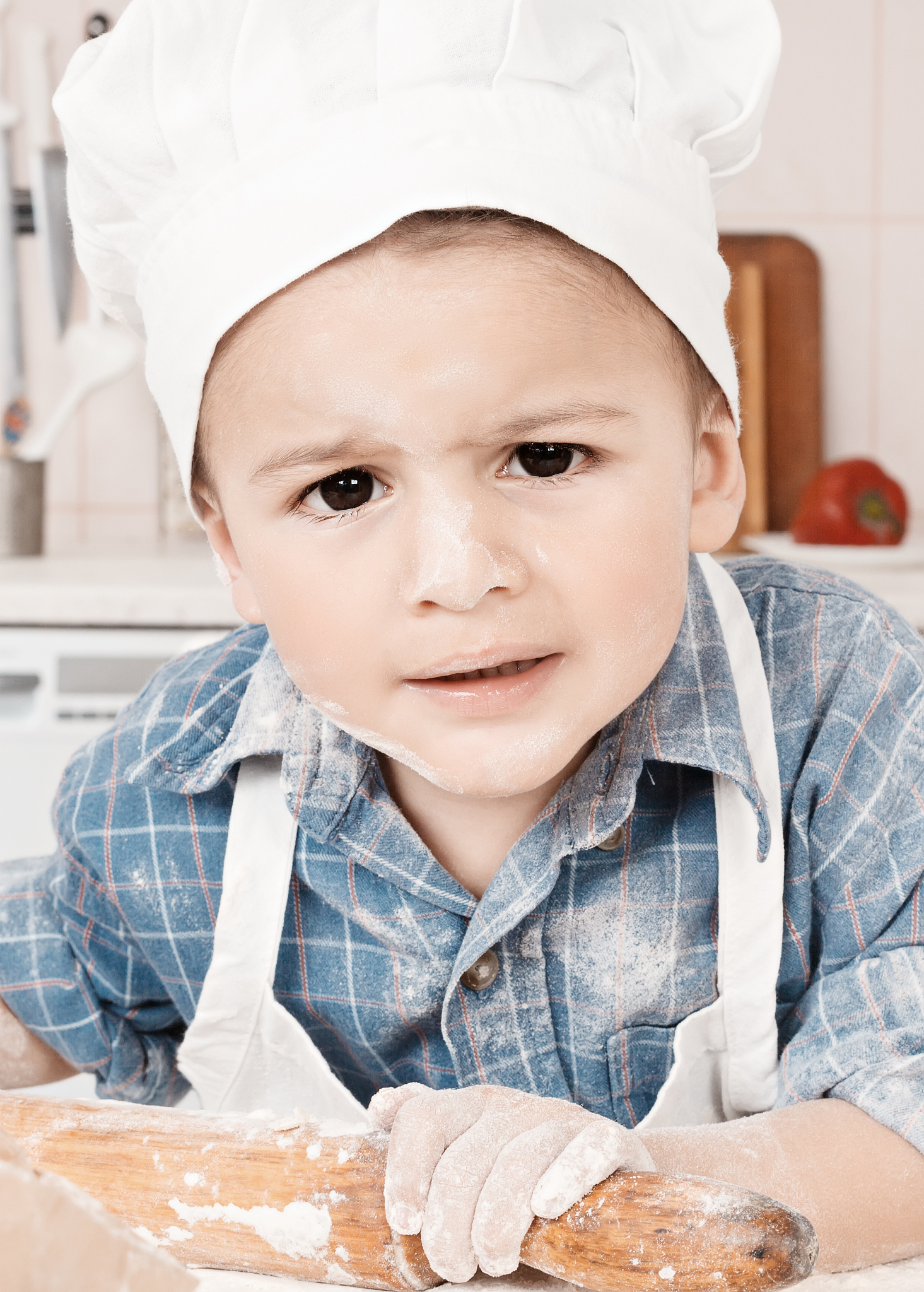 portrait of a little chef hat and apron
