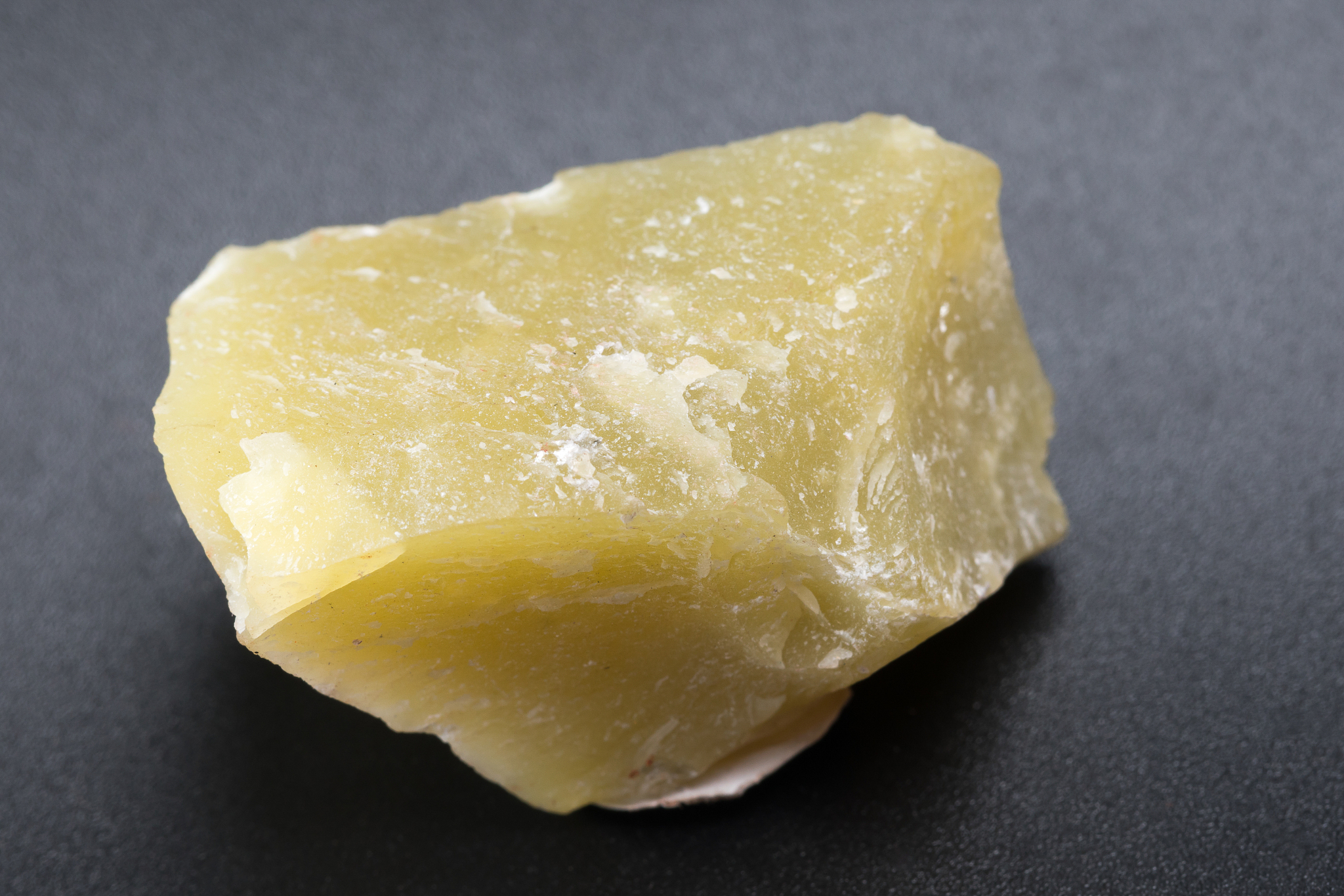 lemon jade mineral sample studio shot with black background