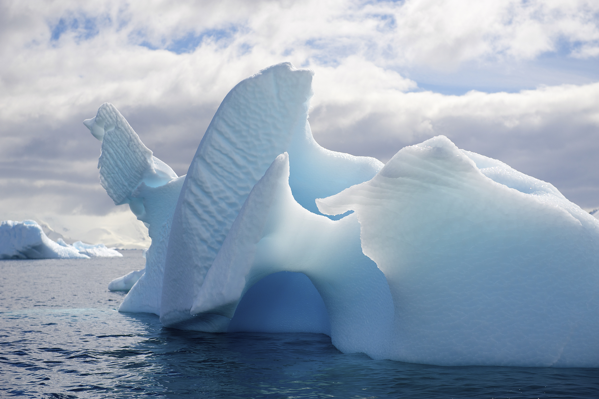 blue iceberg in the antarctic