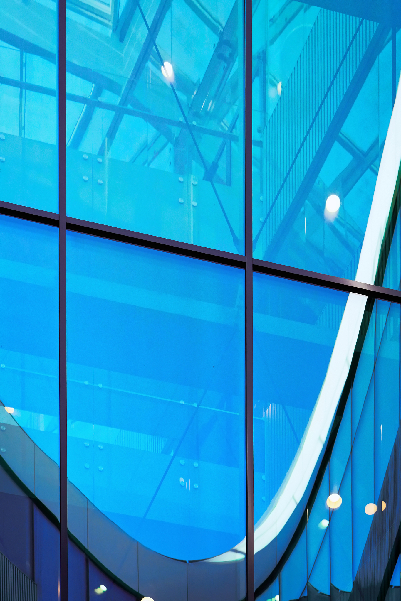 glass windows of modern futuristic skyscraper