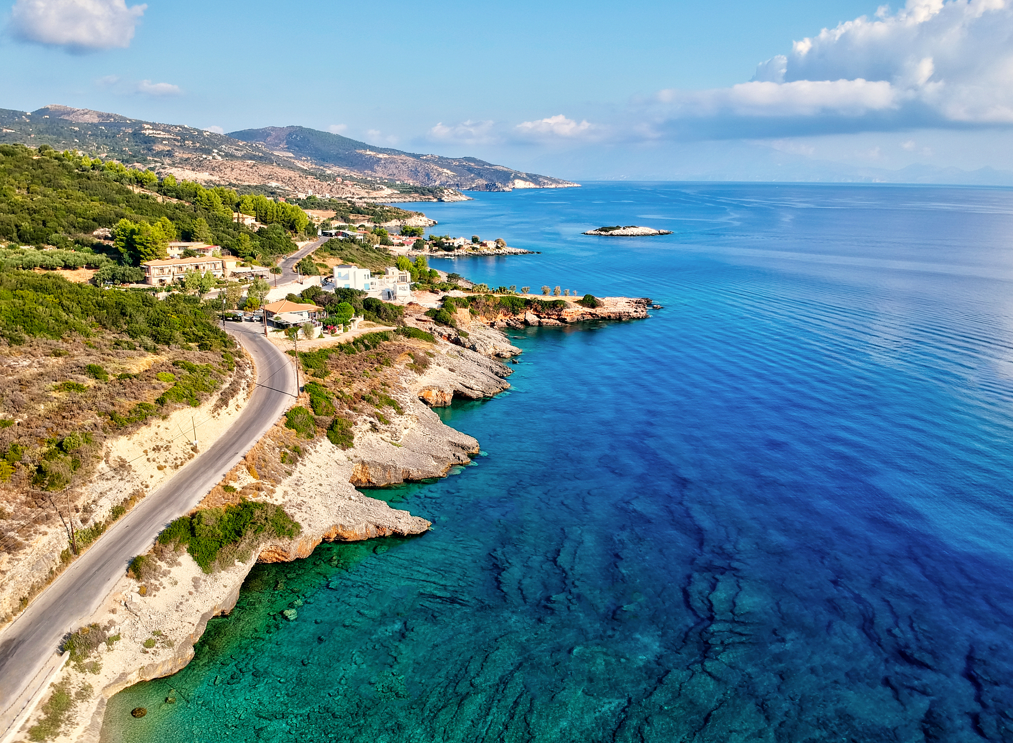 aerial view on beach, coast of sea and road from above in zakynt
