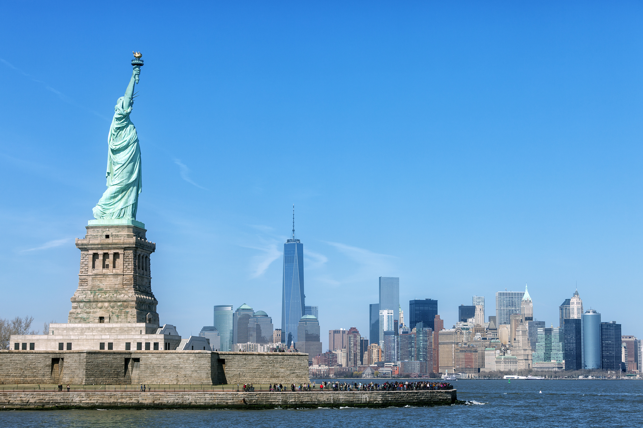 statue of liberty and new york skyline