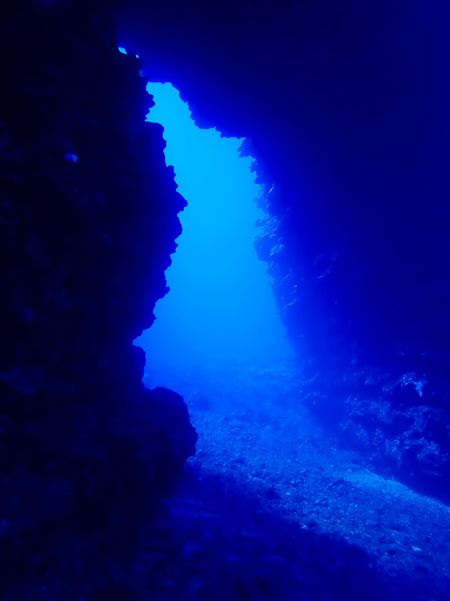 lava arch underwater in hawaii