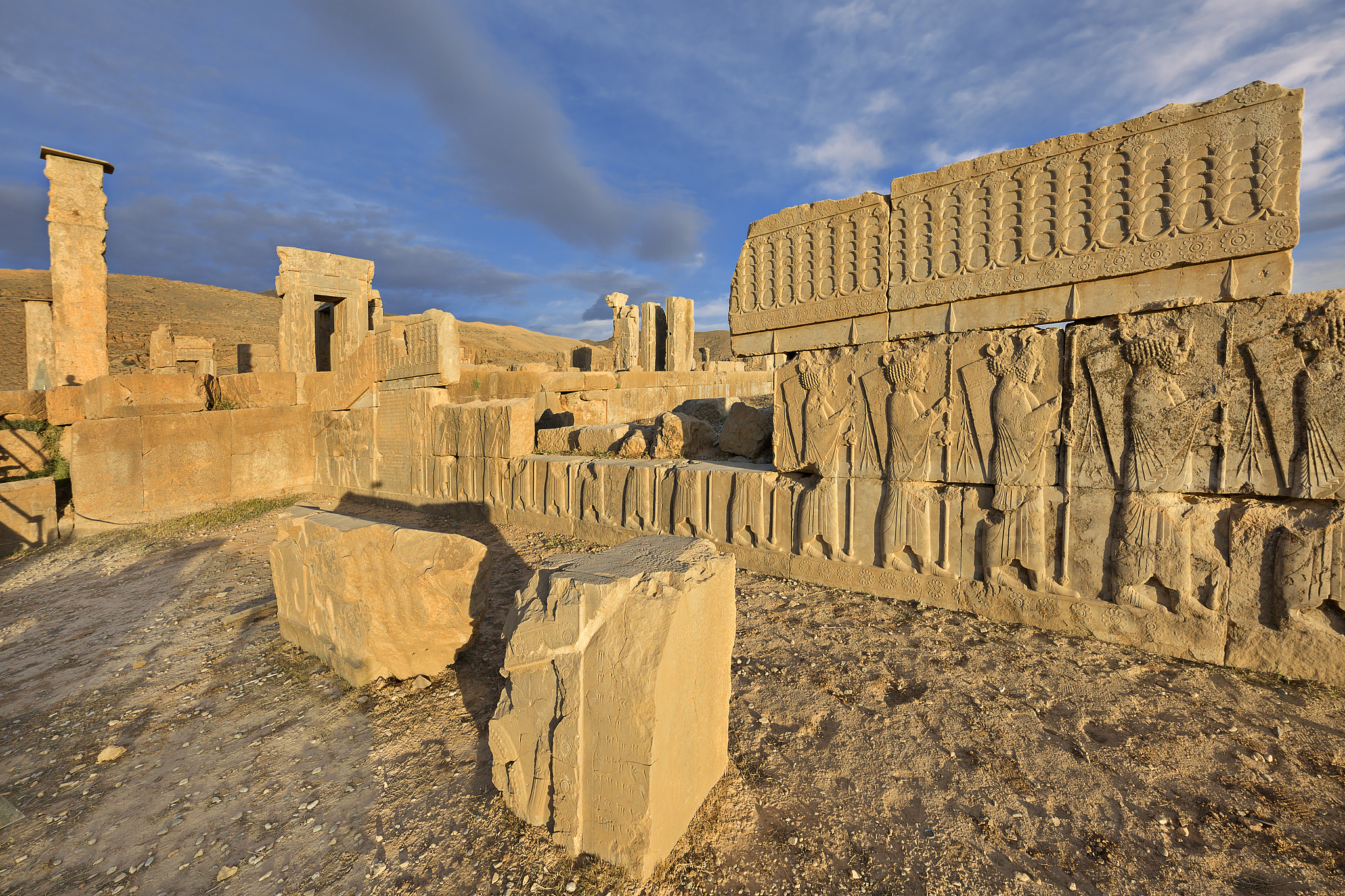 persian reliefs at the sunset, in the remains of the old city of