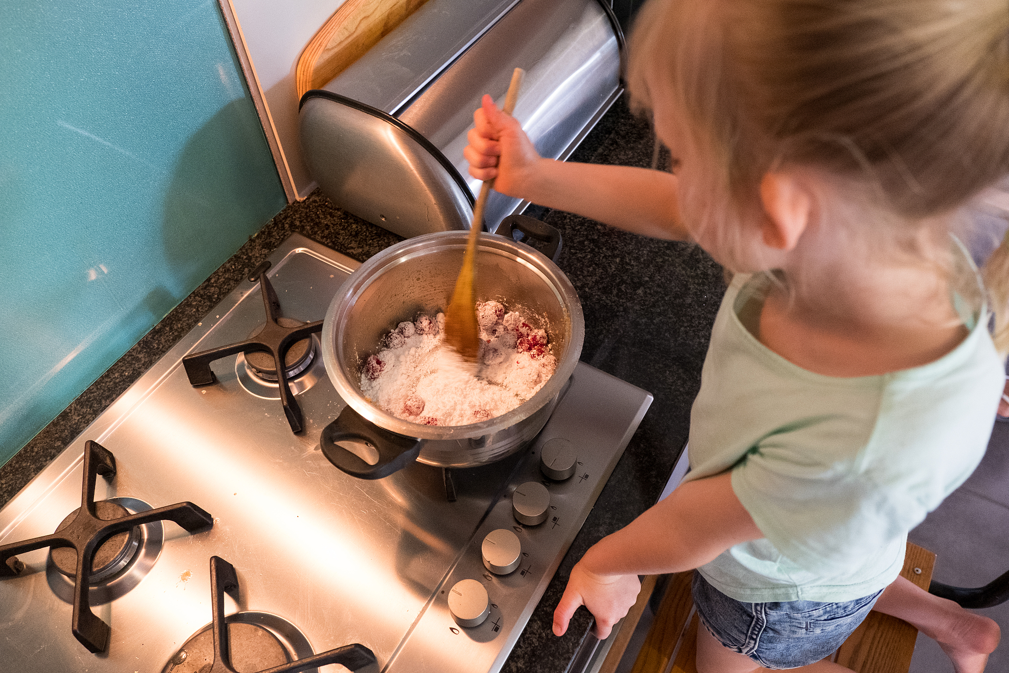 young girl cooking in the kitchen