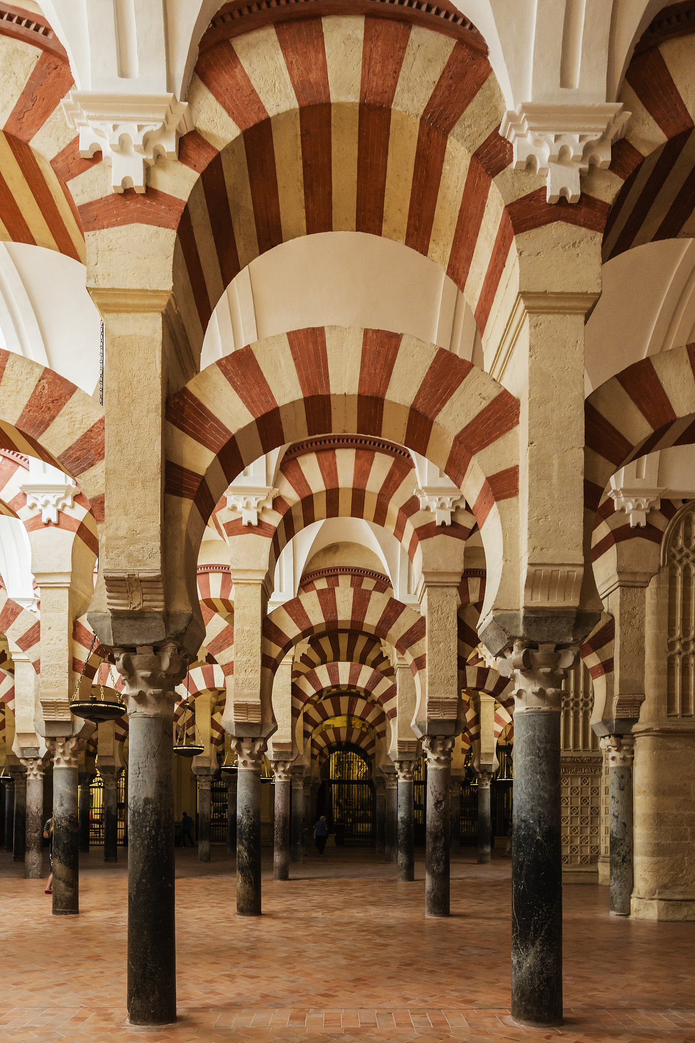 ornate arches in mosque, cordoba, andalusia, spain