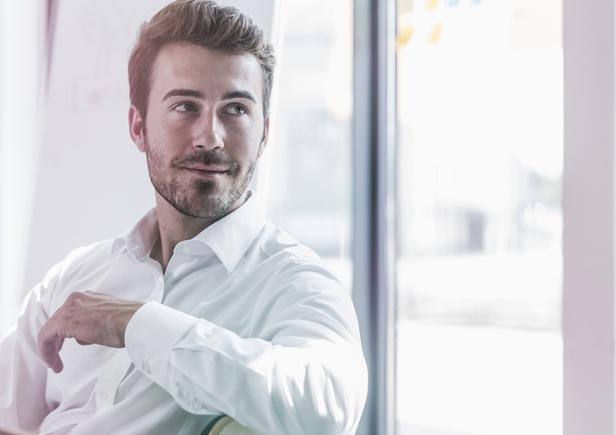businessman in office thinking