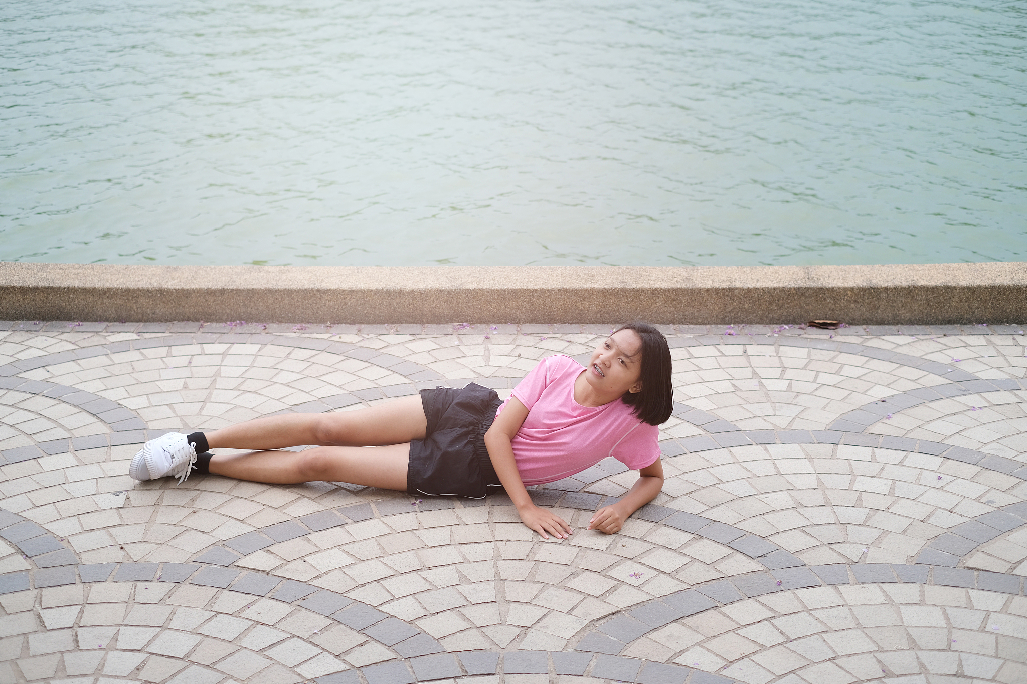 happy young asian girl doing yoga at garden.