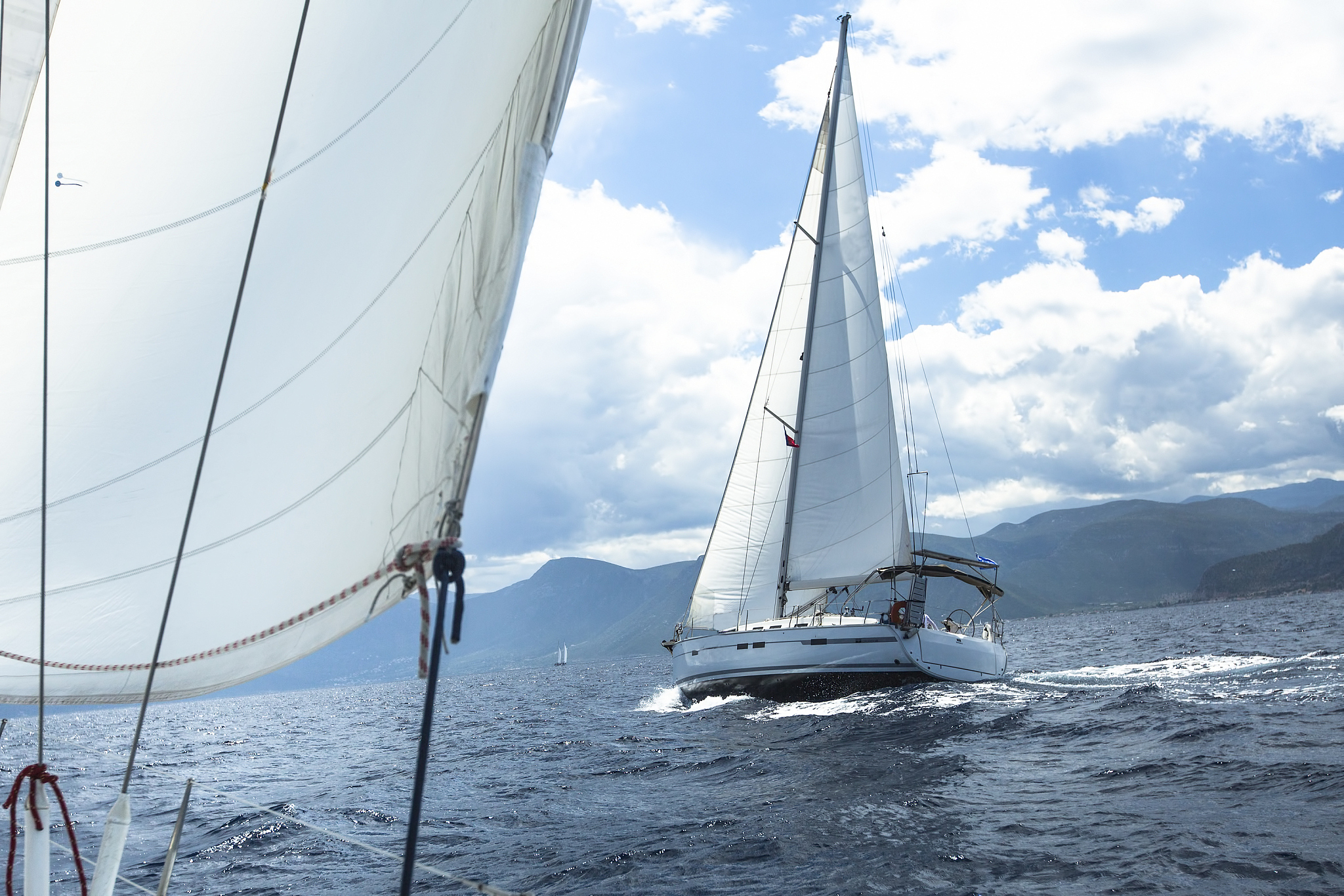 sailing. ship yachts with white sails in the open sea