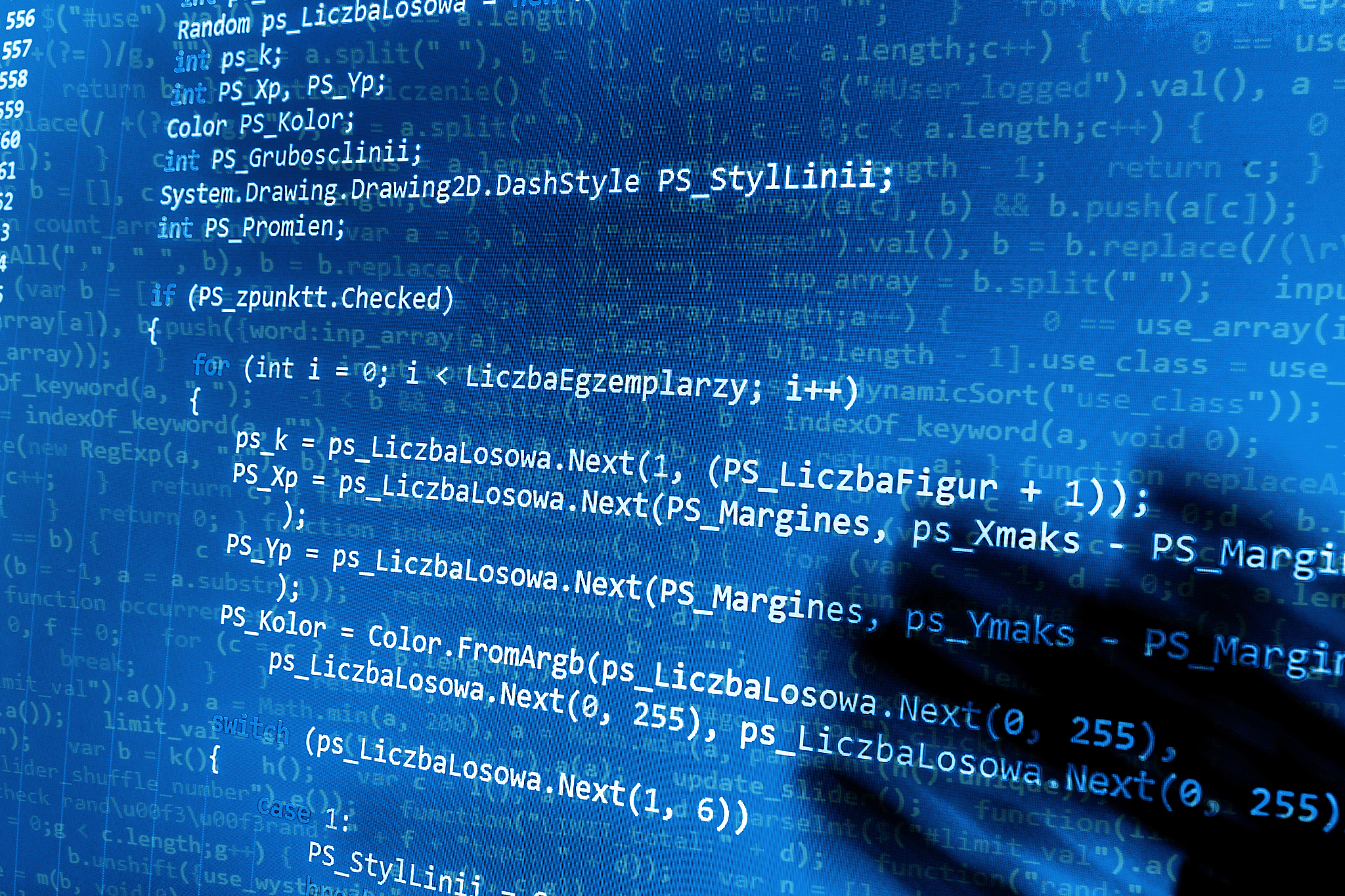 software developer programming code on computer