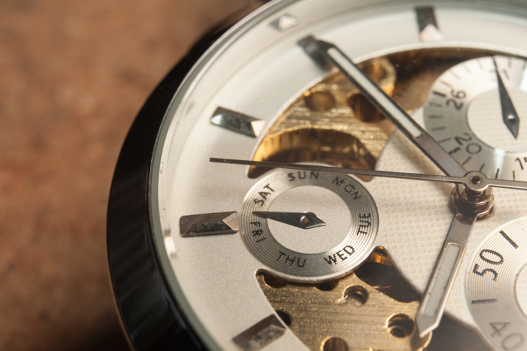 detail of watch machinery on the table.