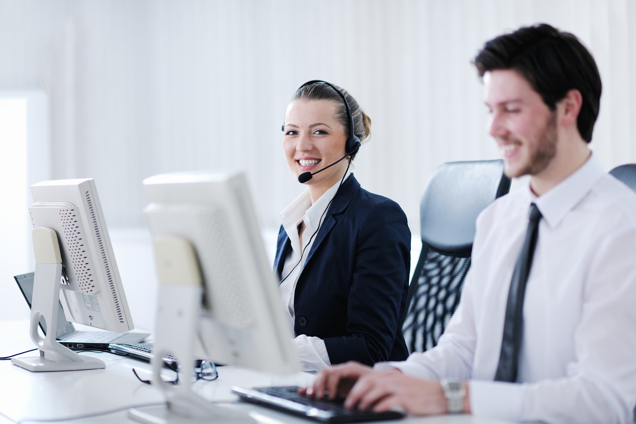 business people group with  headphones giving support in  help d