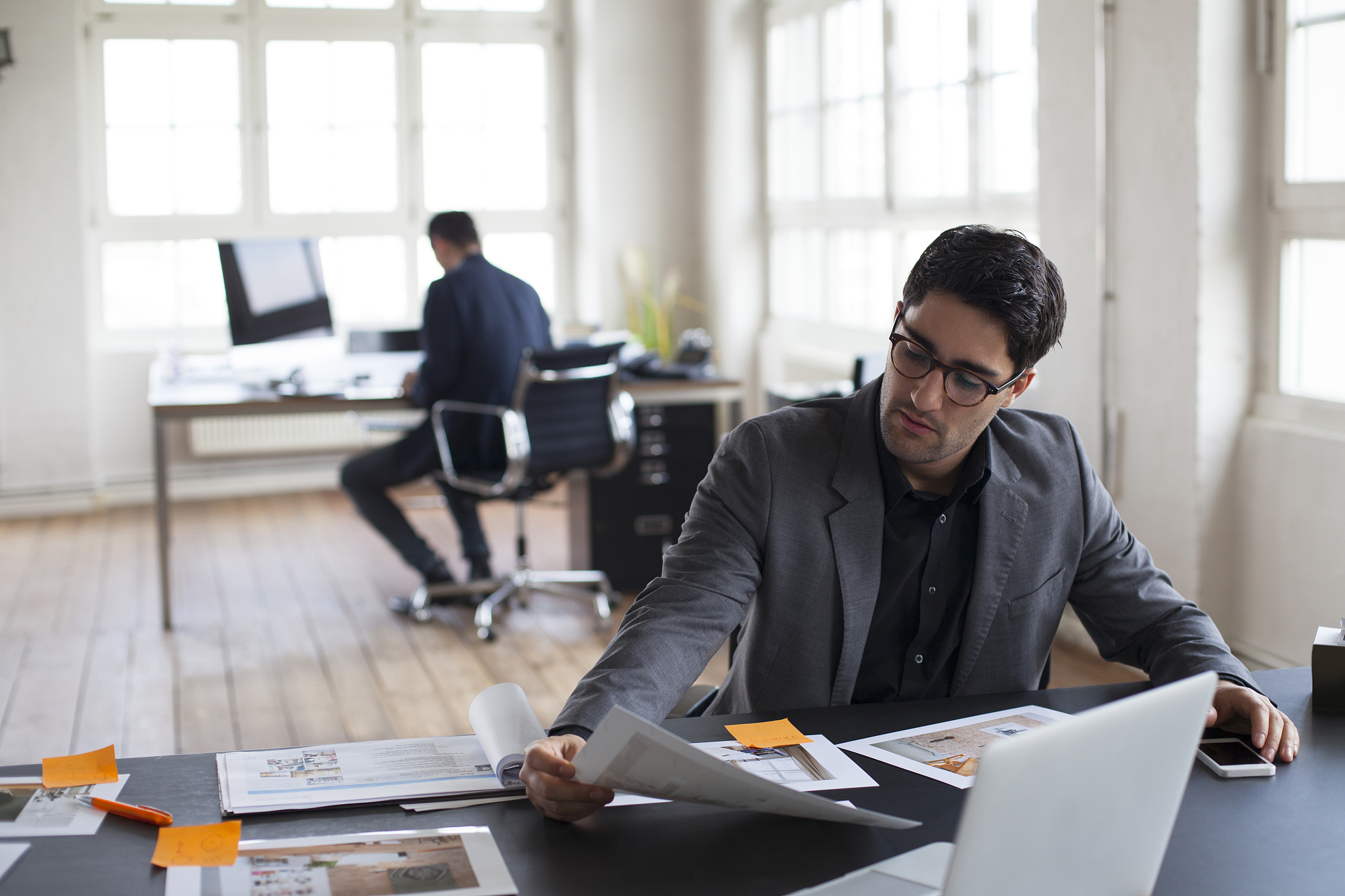 two businessmen working in office
