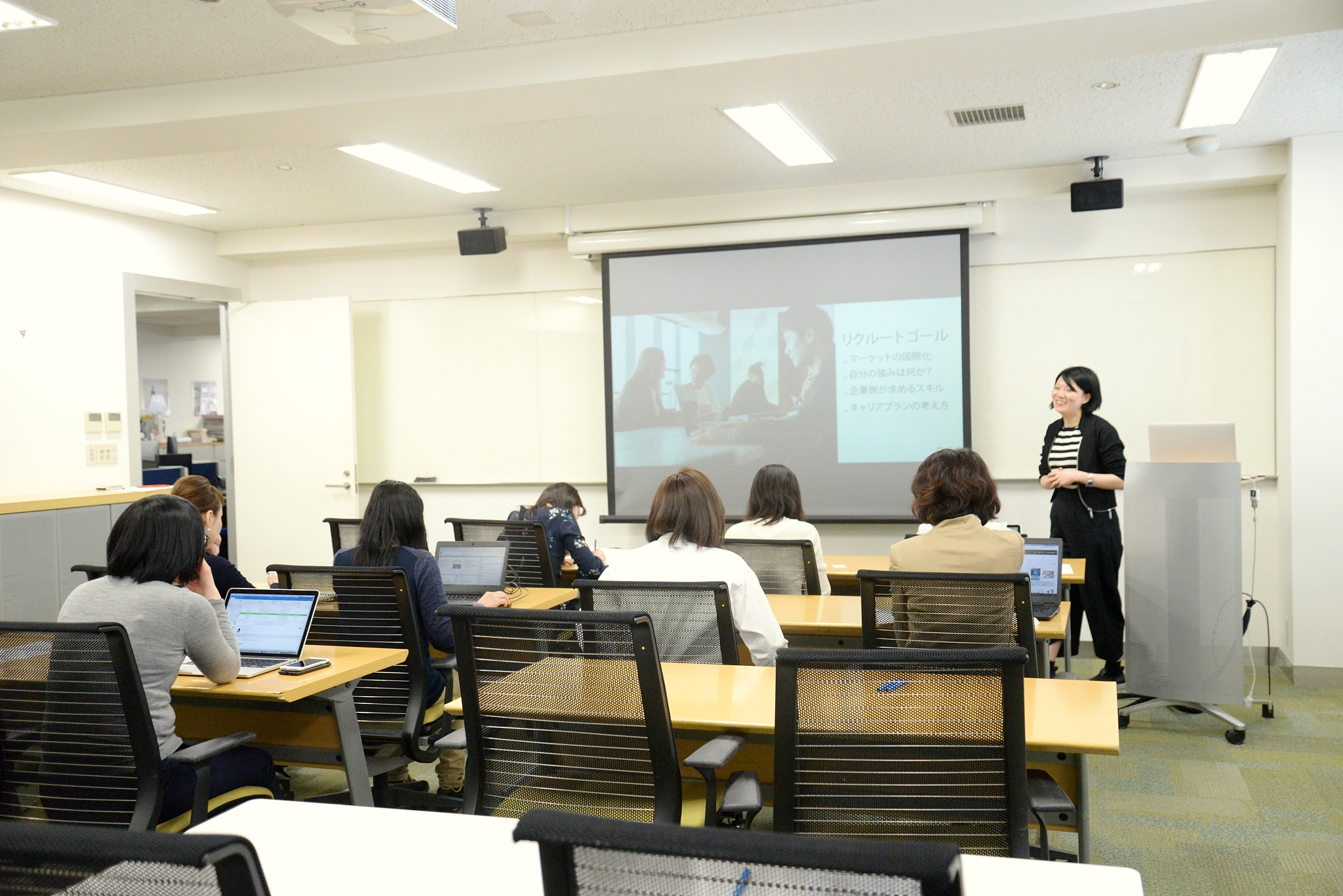 young business woman giving a presentation