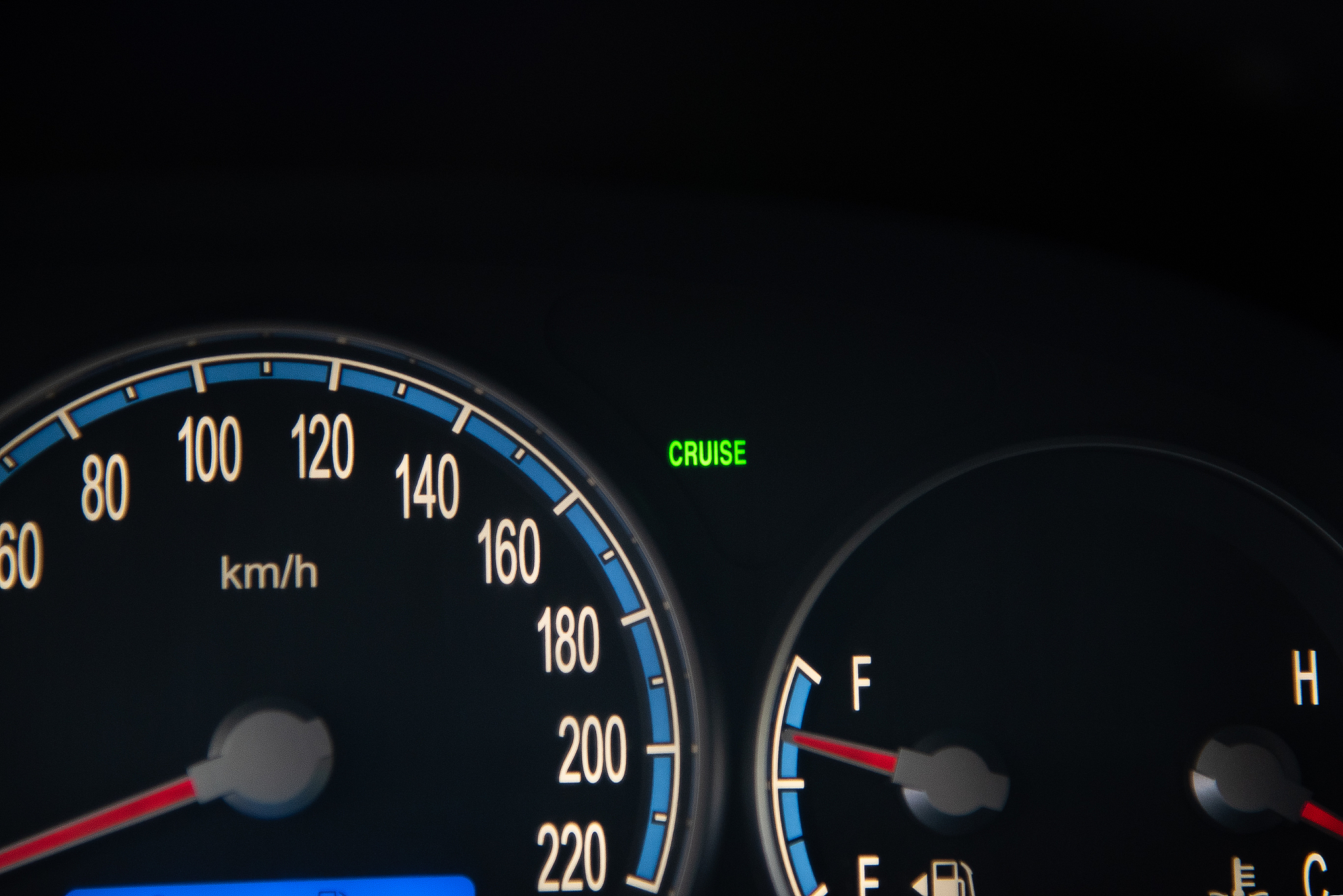 cruise light on an suv dashboard