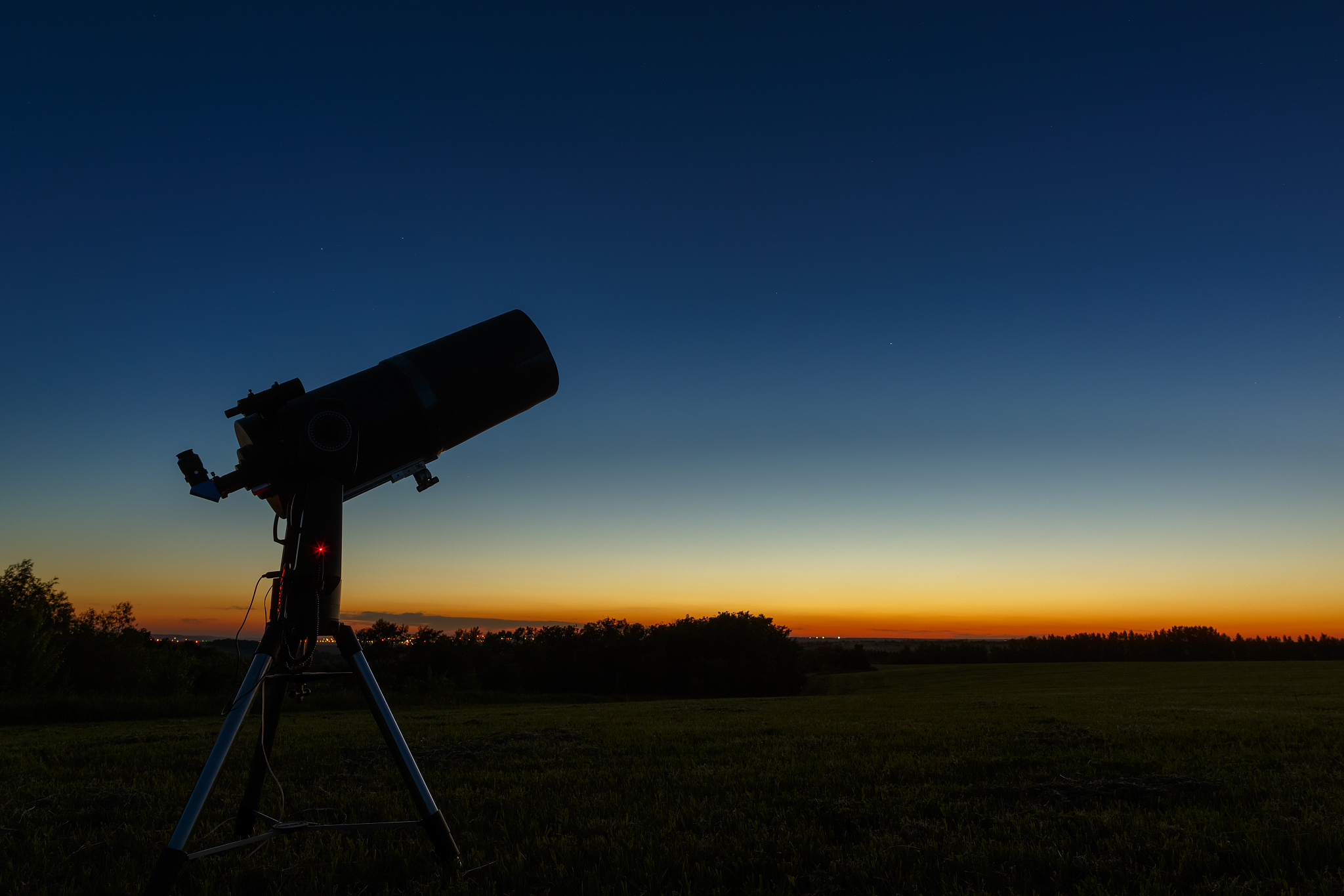 telescope to study stars and planets is prepared for outdoor obs
