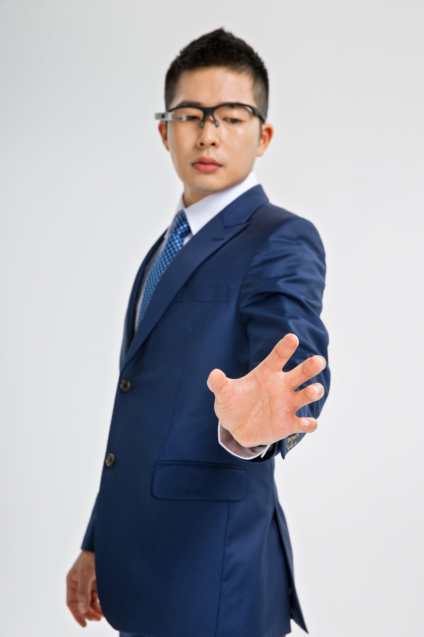 businessman with glasses posing