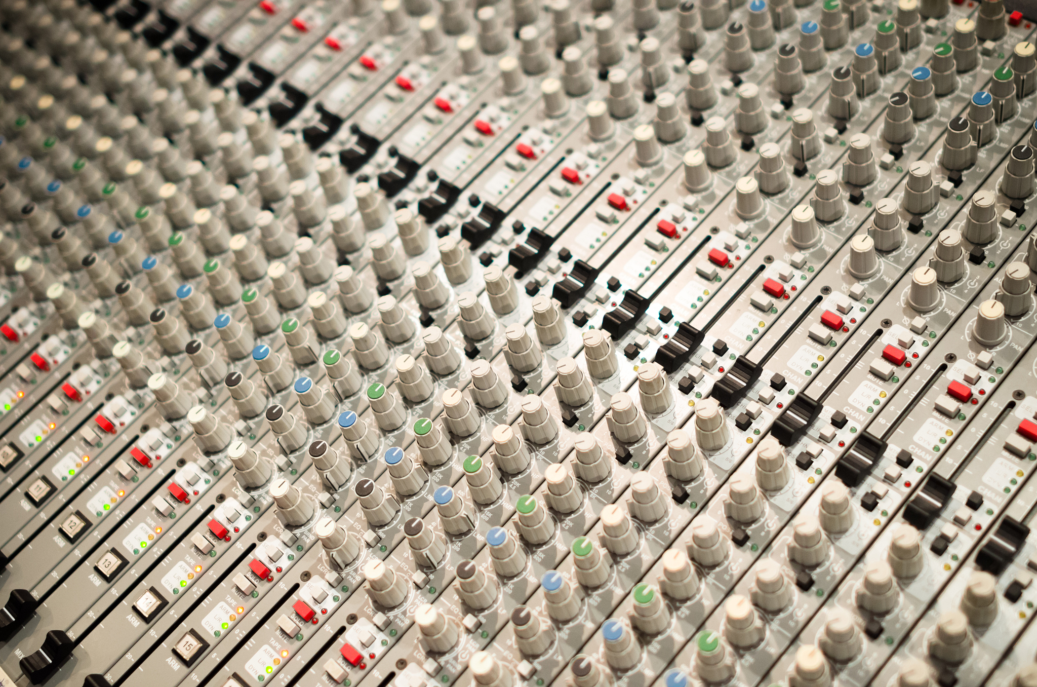 sound mixer console in a recording studio