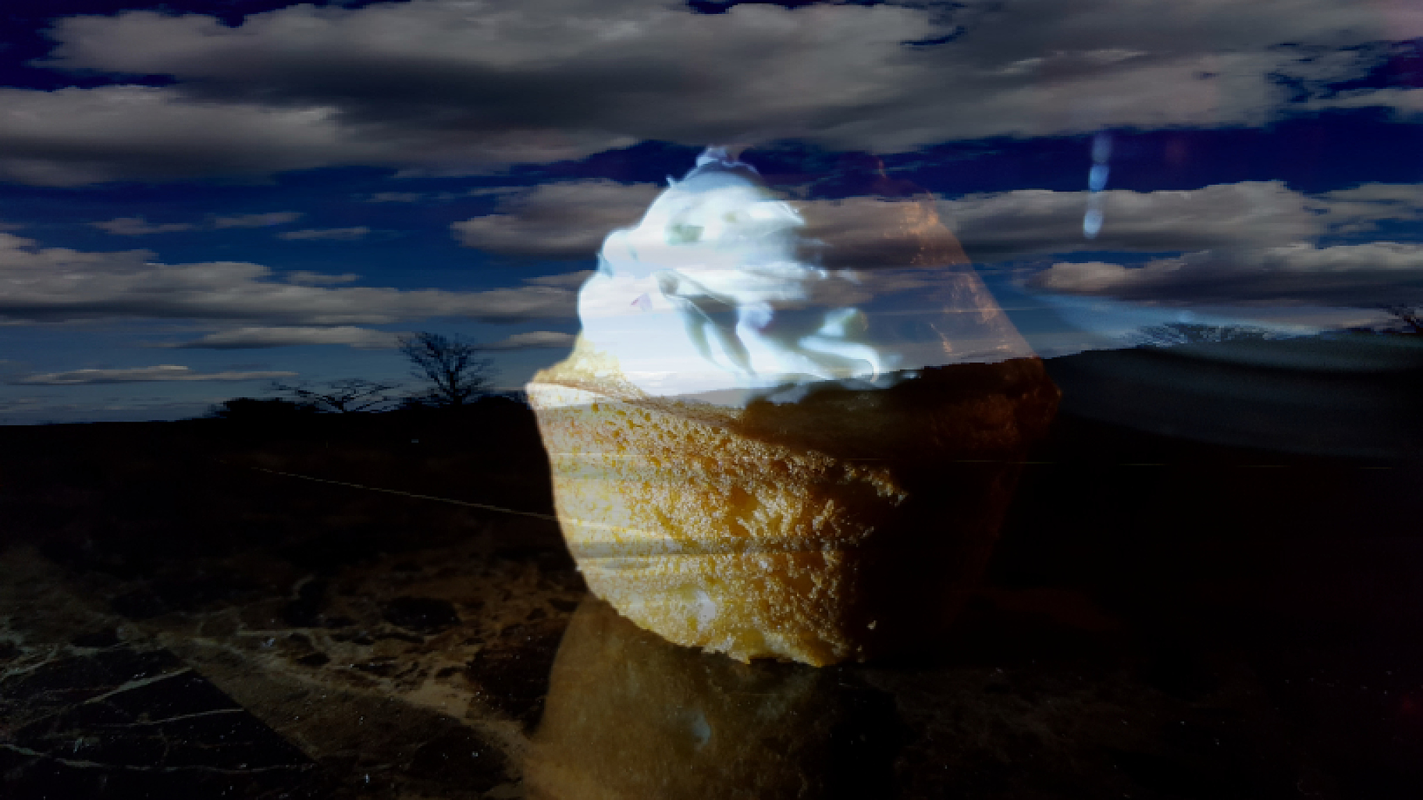 double exposure of fresh cupcake against sky