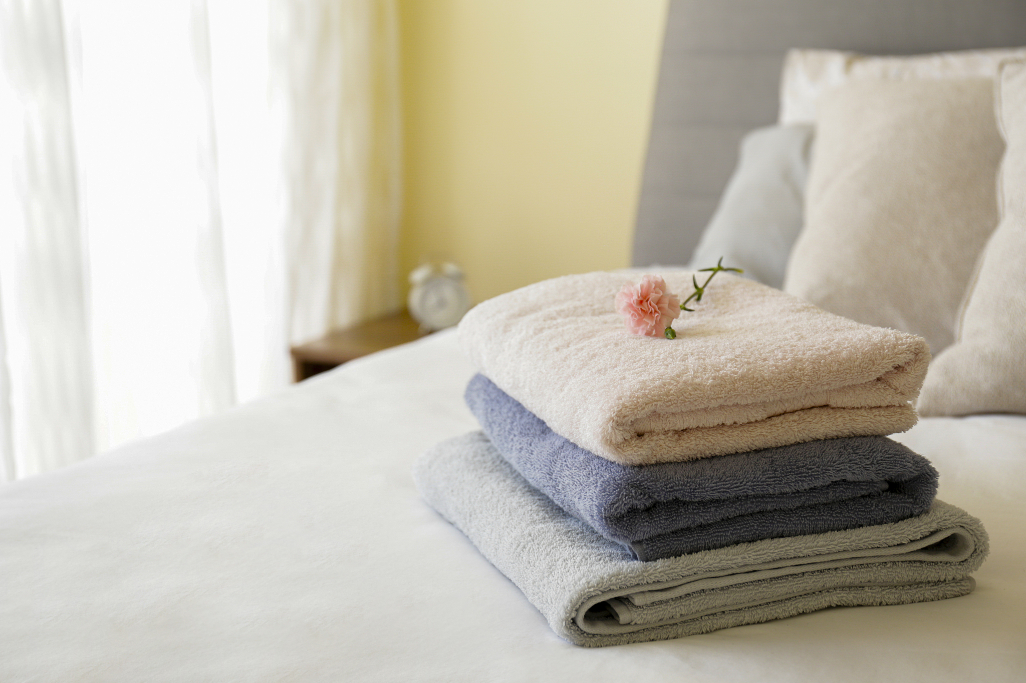 close up shot of freshly laundered bath accessories of different