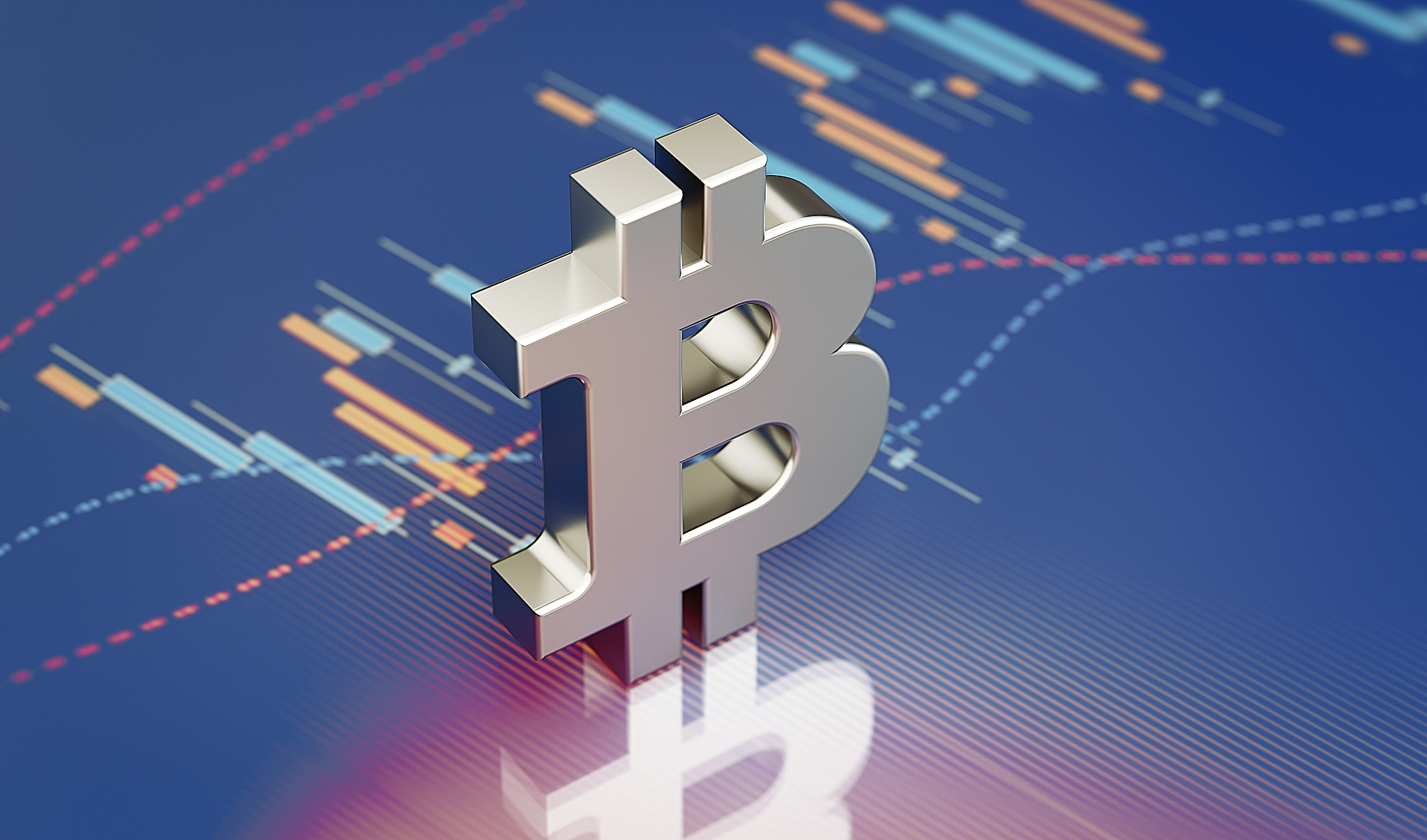 bitcoin symbol standing over a financial graph