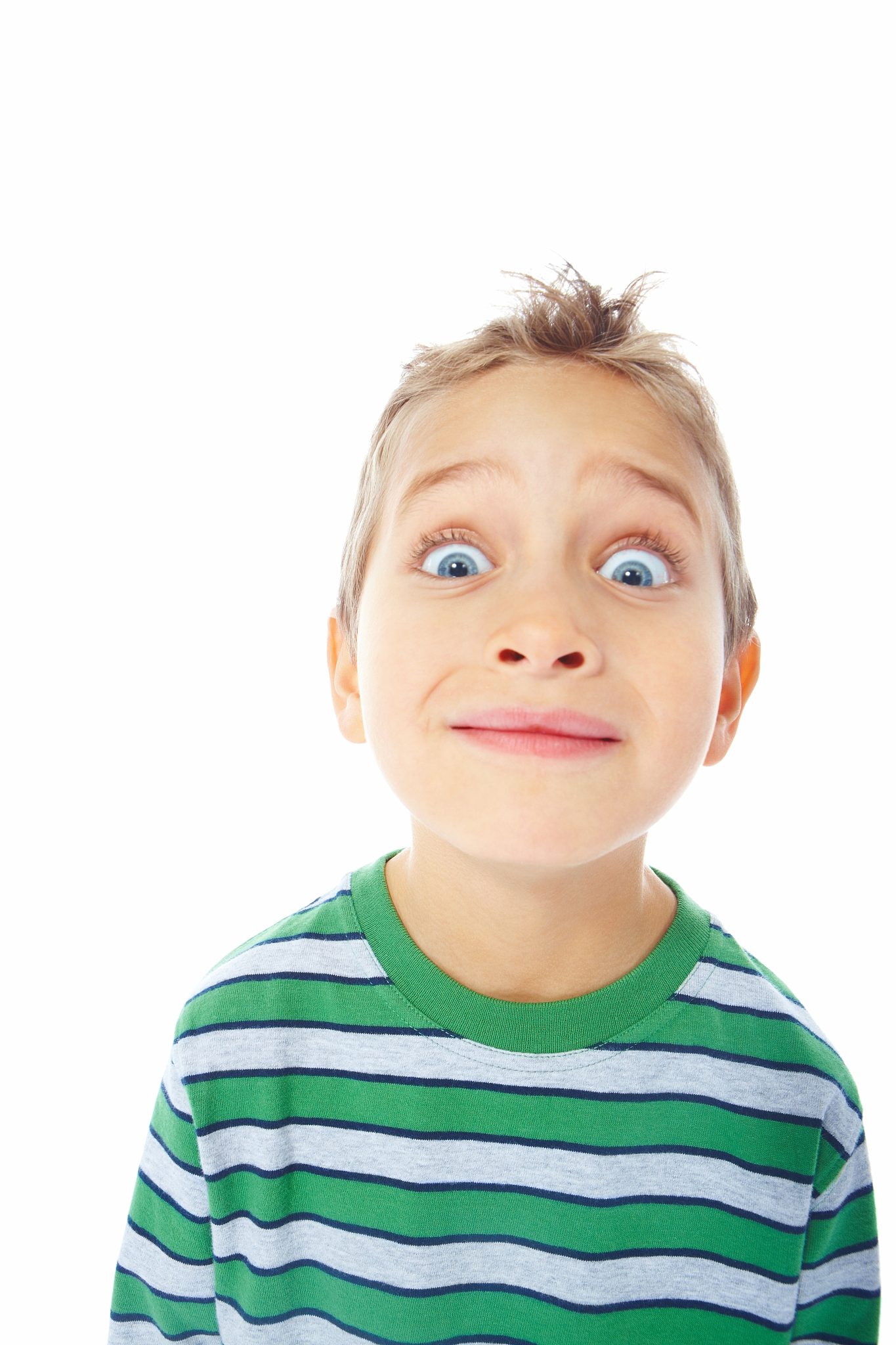 closeup portrait of small kid making funny faces over white back