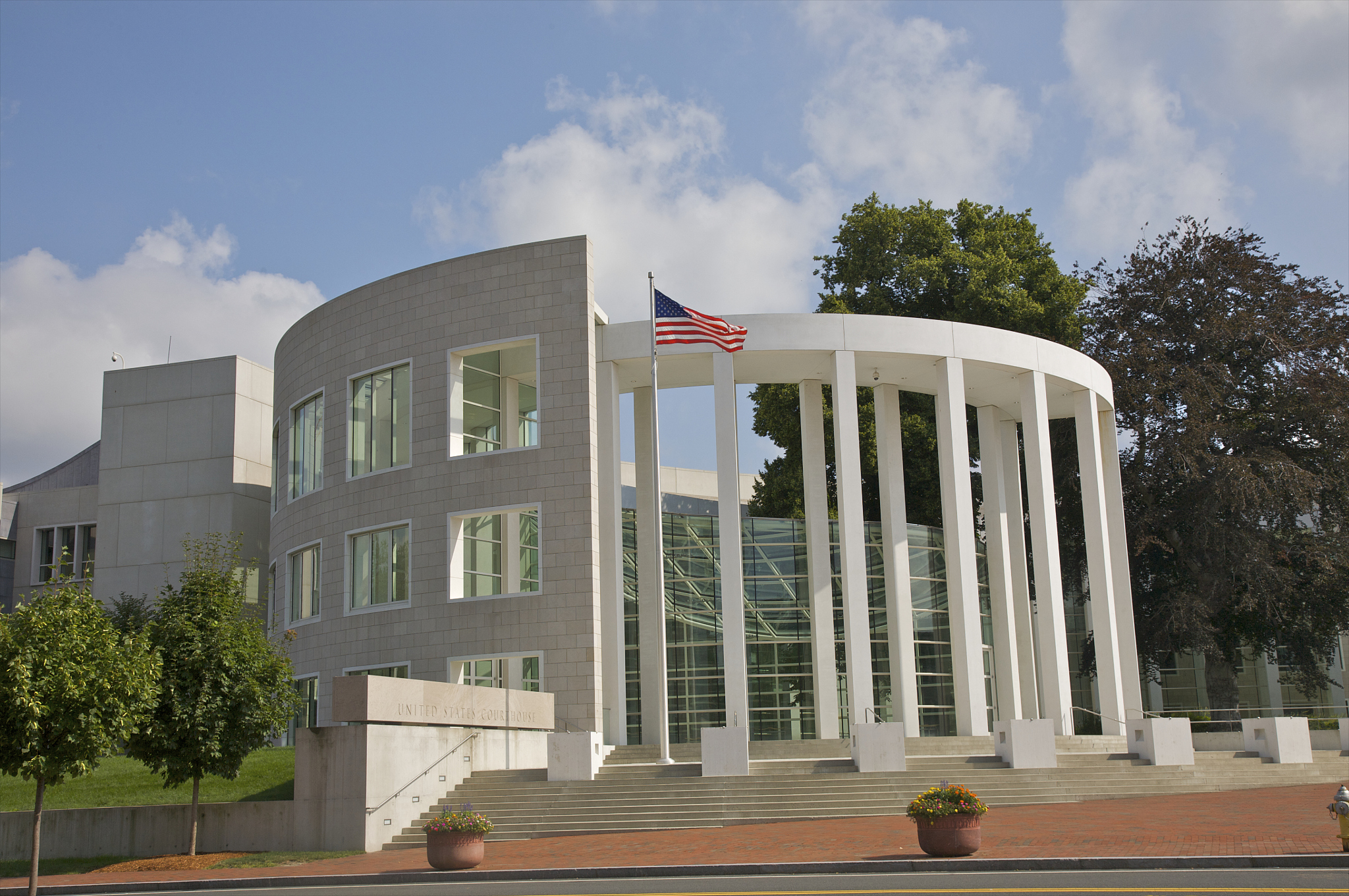 contemporary white building with columns.