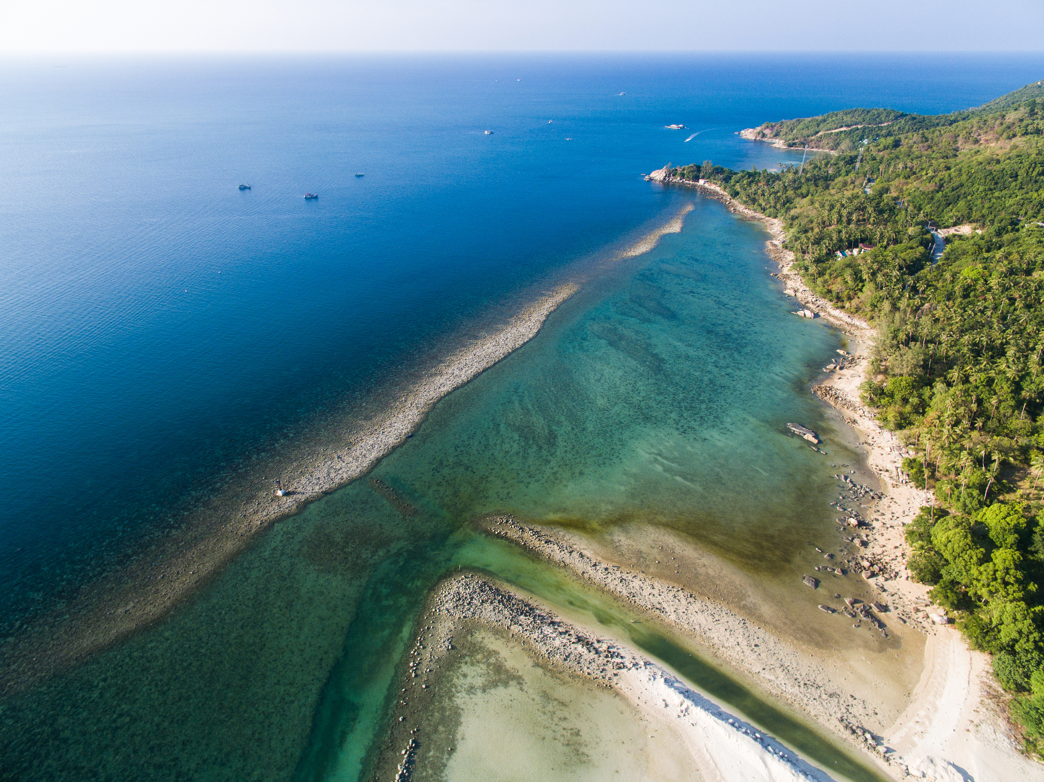 aerial view of the beach from the shallow water