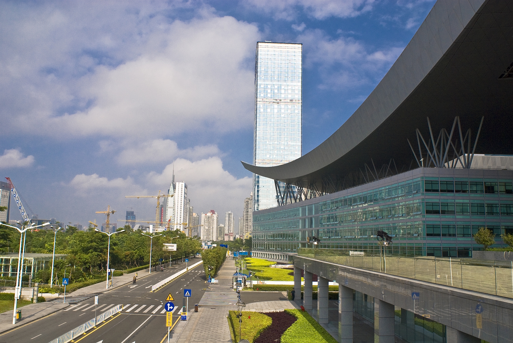correct the sentenceMy hometown is Guangzhou which is a super metropoli city in south China really close to HongKong and also it is the home of dim sum