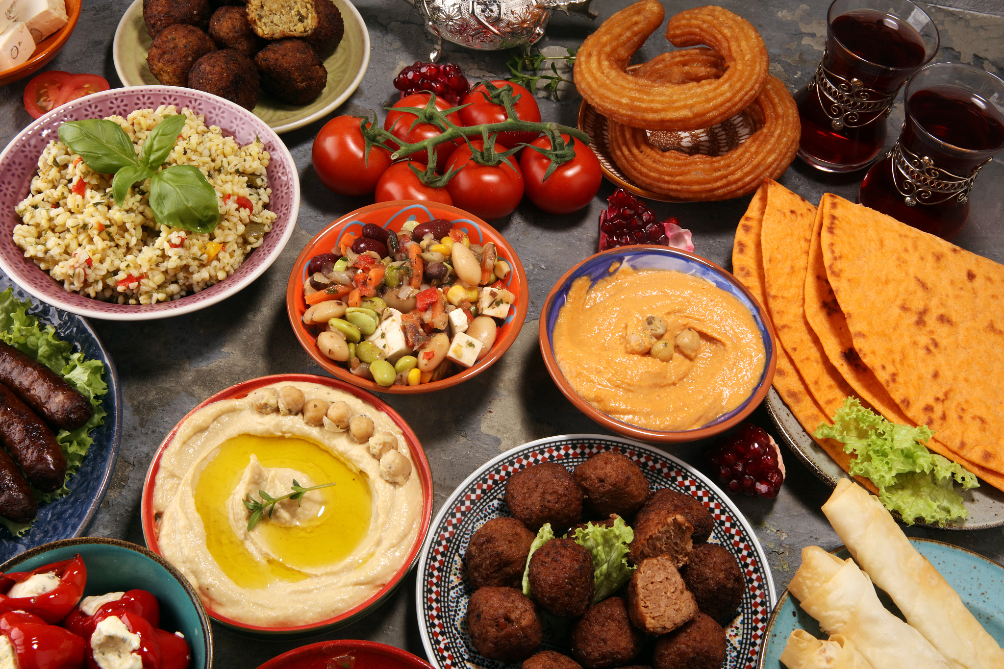 middle eastern or arabic dishes and assorted meze, concrete rust