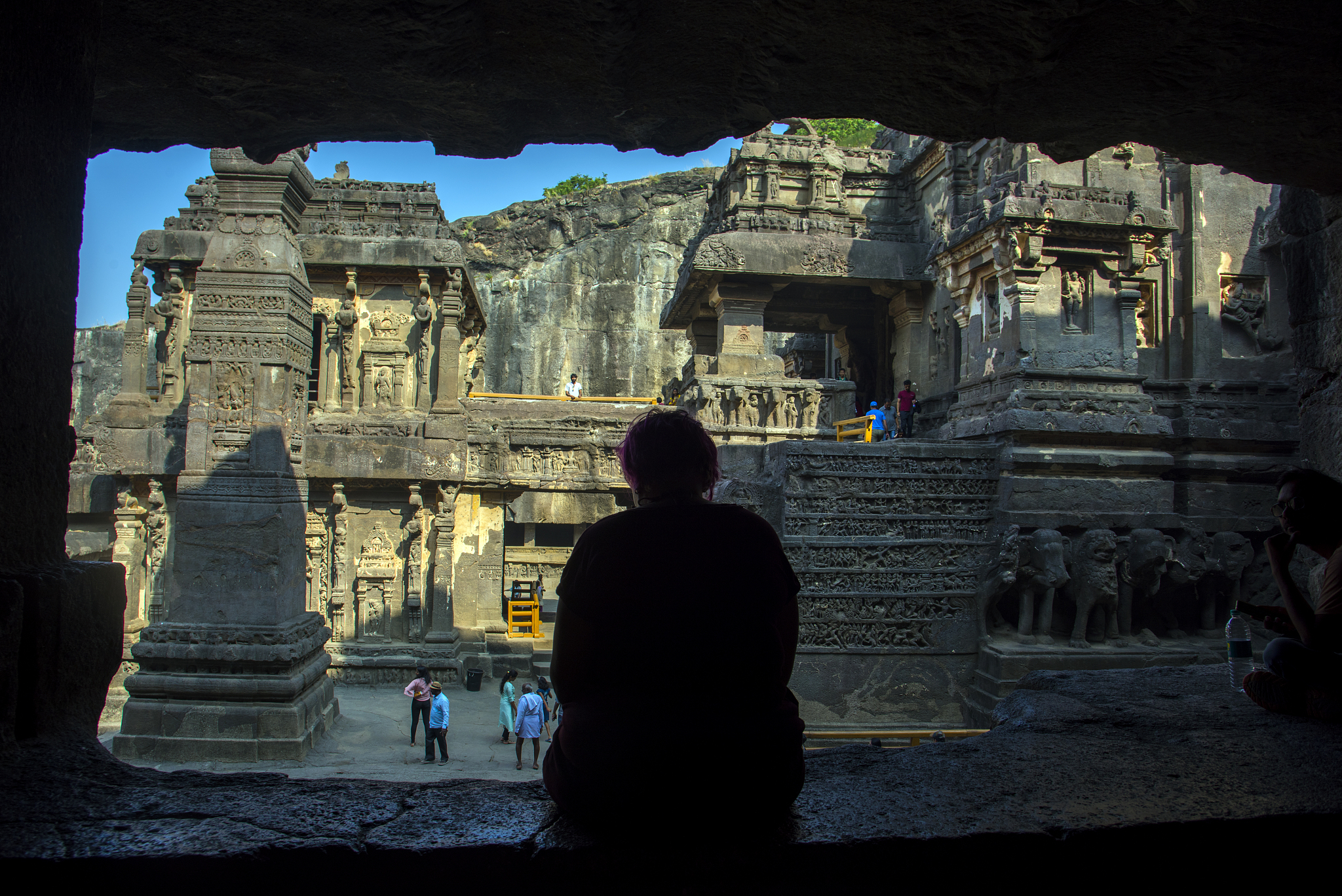 rear view of silhouette tourist at kailasa temple, ellora caves,