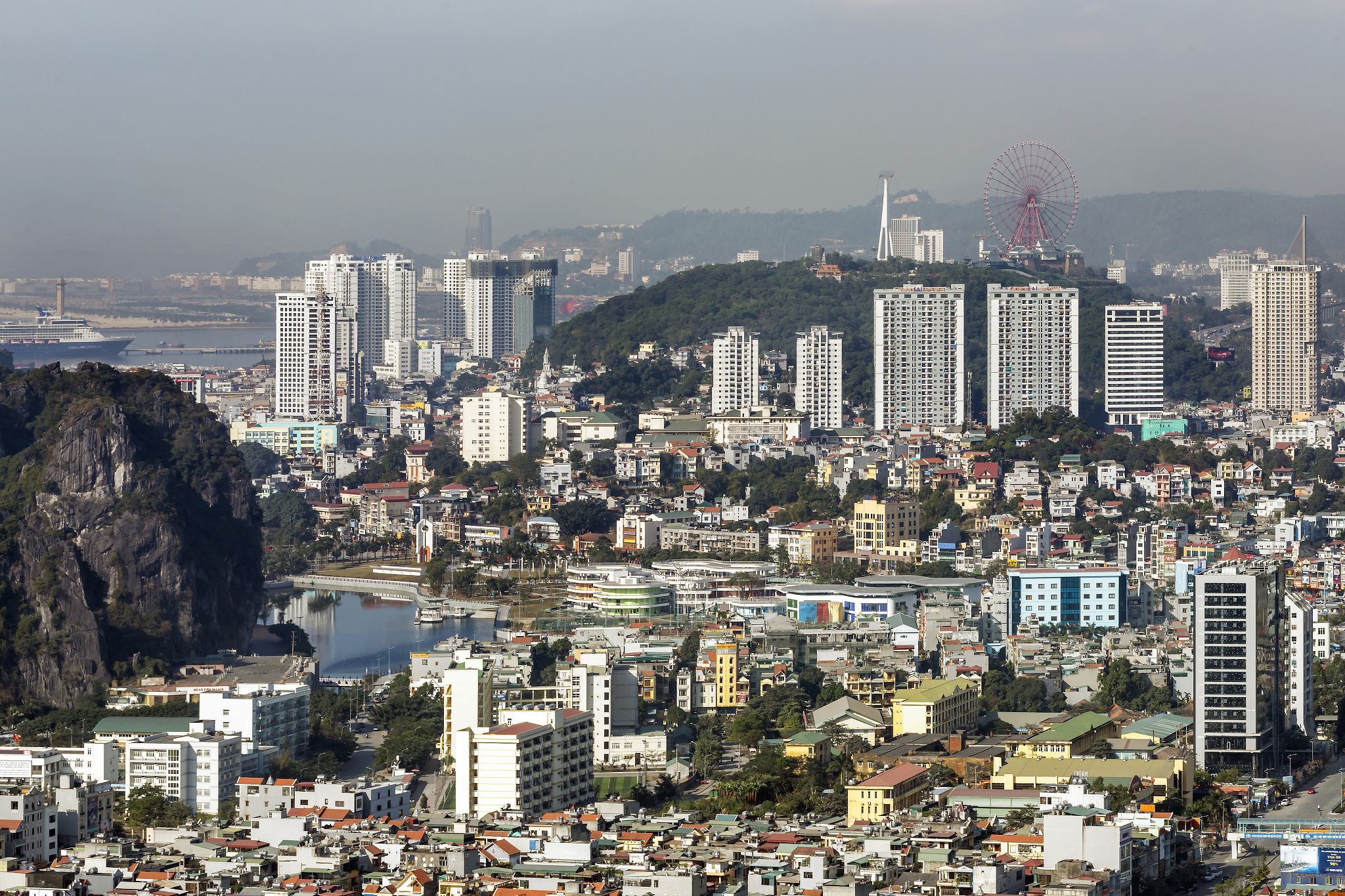 high angle view of buildings in city against sky