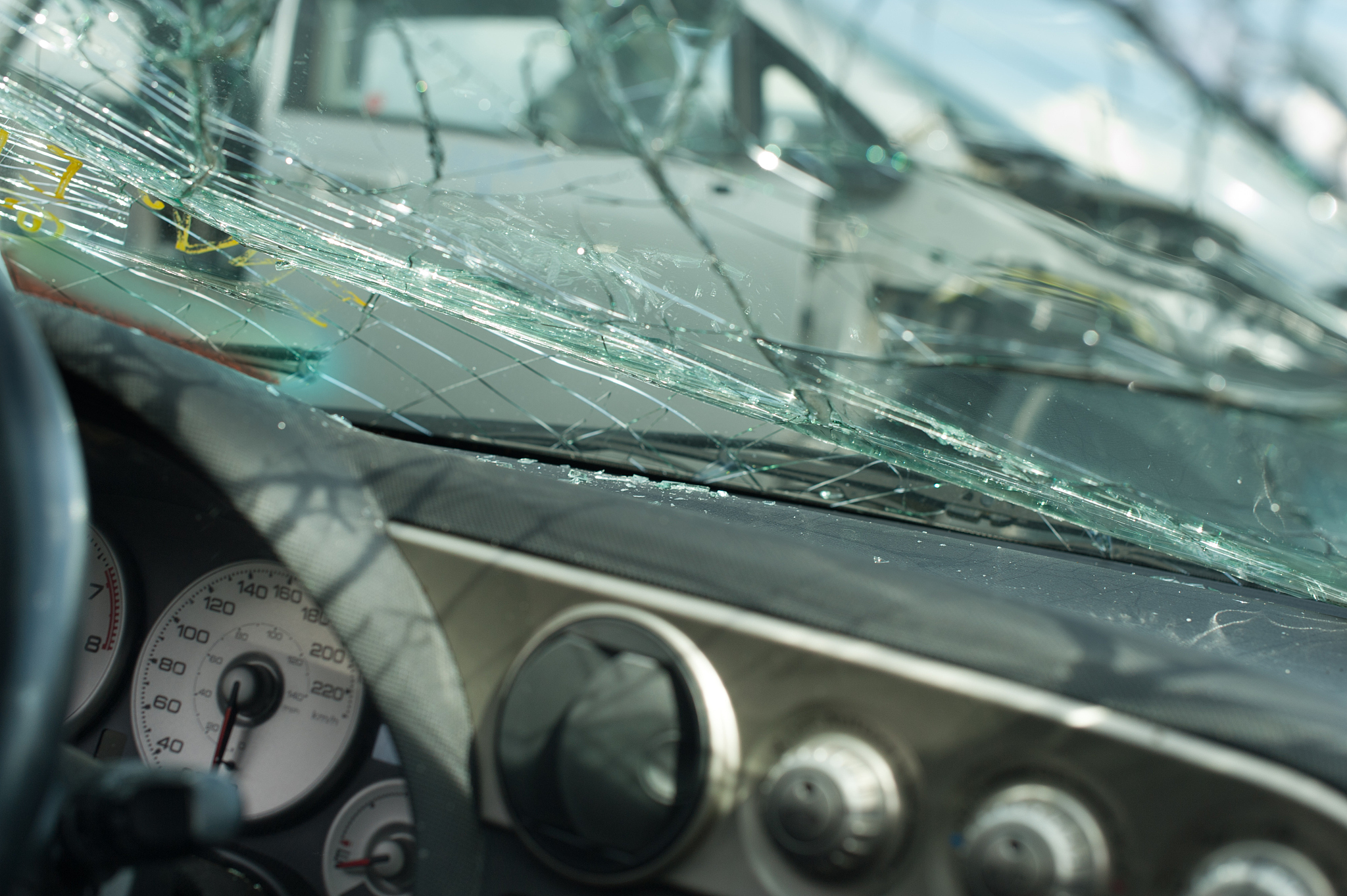 car crash accident on street, damaged car broken glass dash