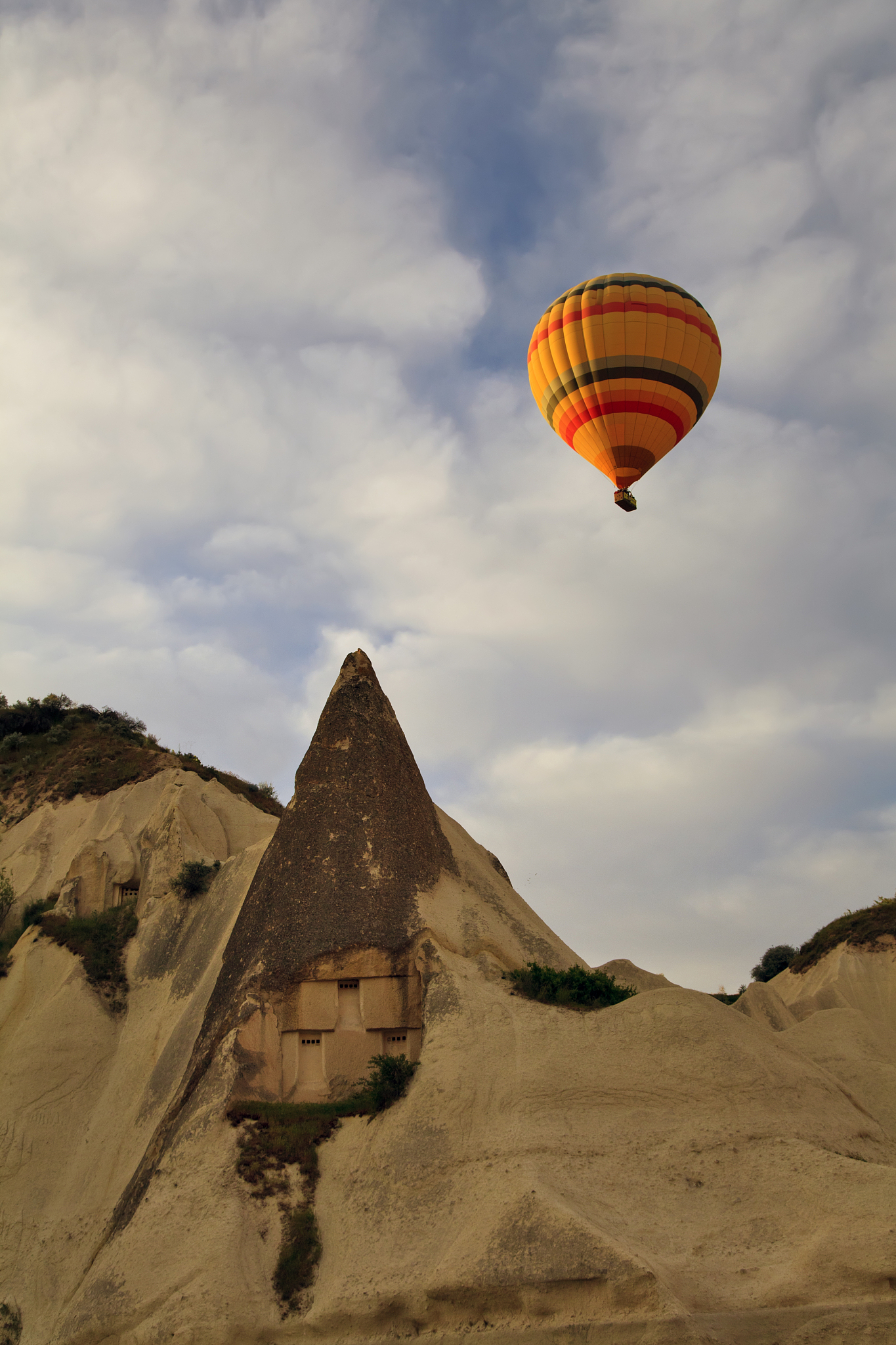 balloon in cappadocia over the ancient city