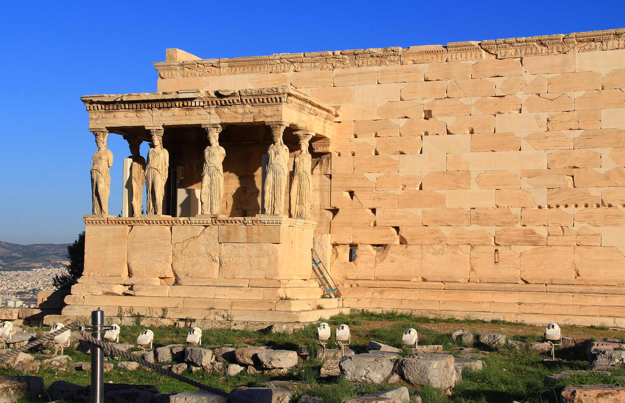 caryatid statues on the porch of the erechtheion in athens, gree