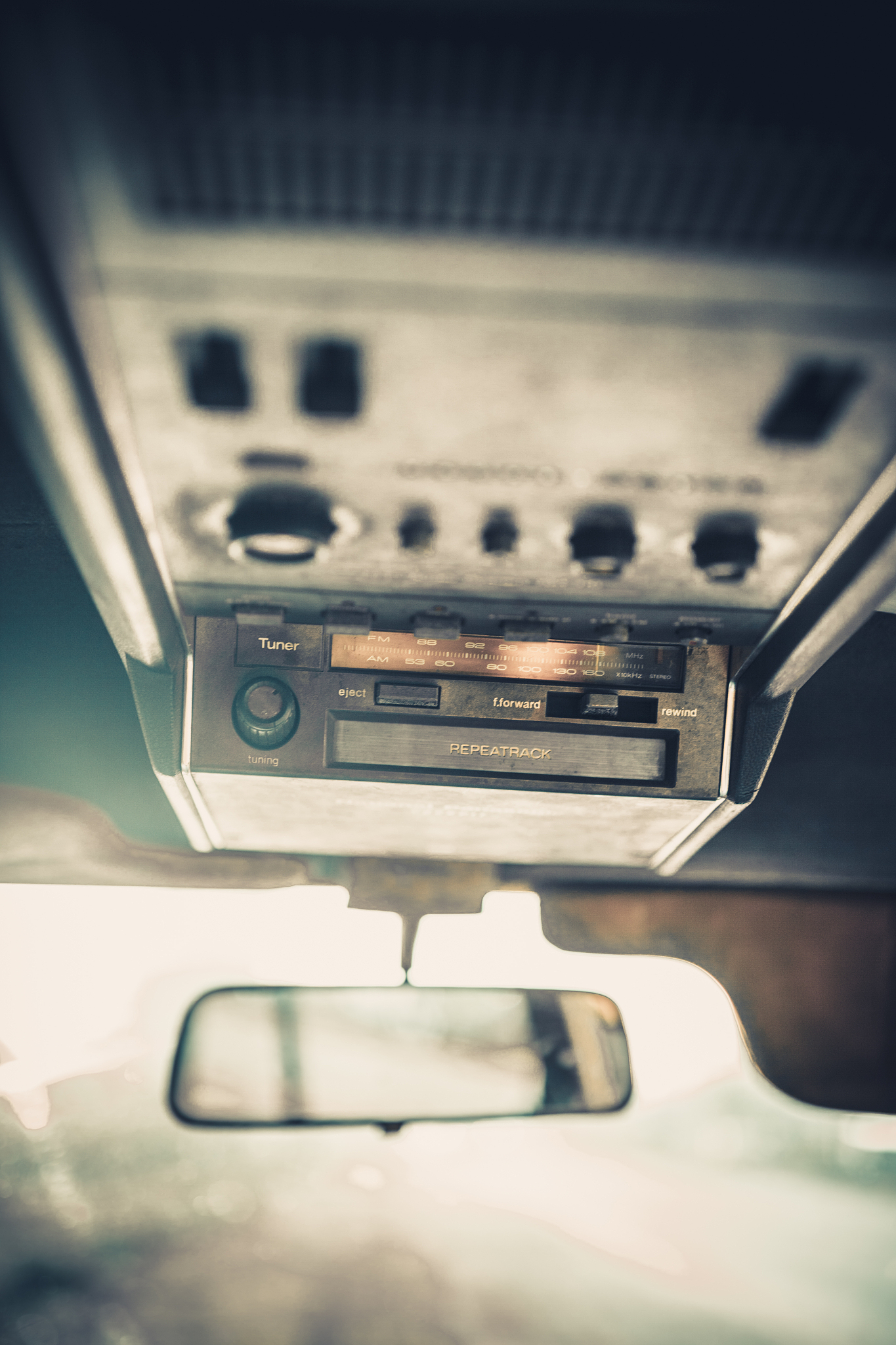 radio cassette with mirror in retro car, vintage picture