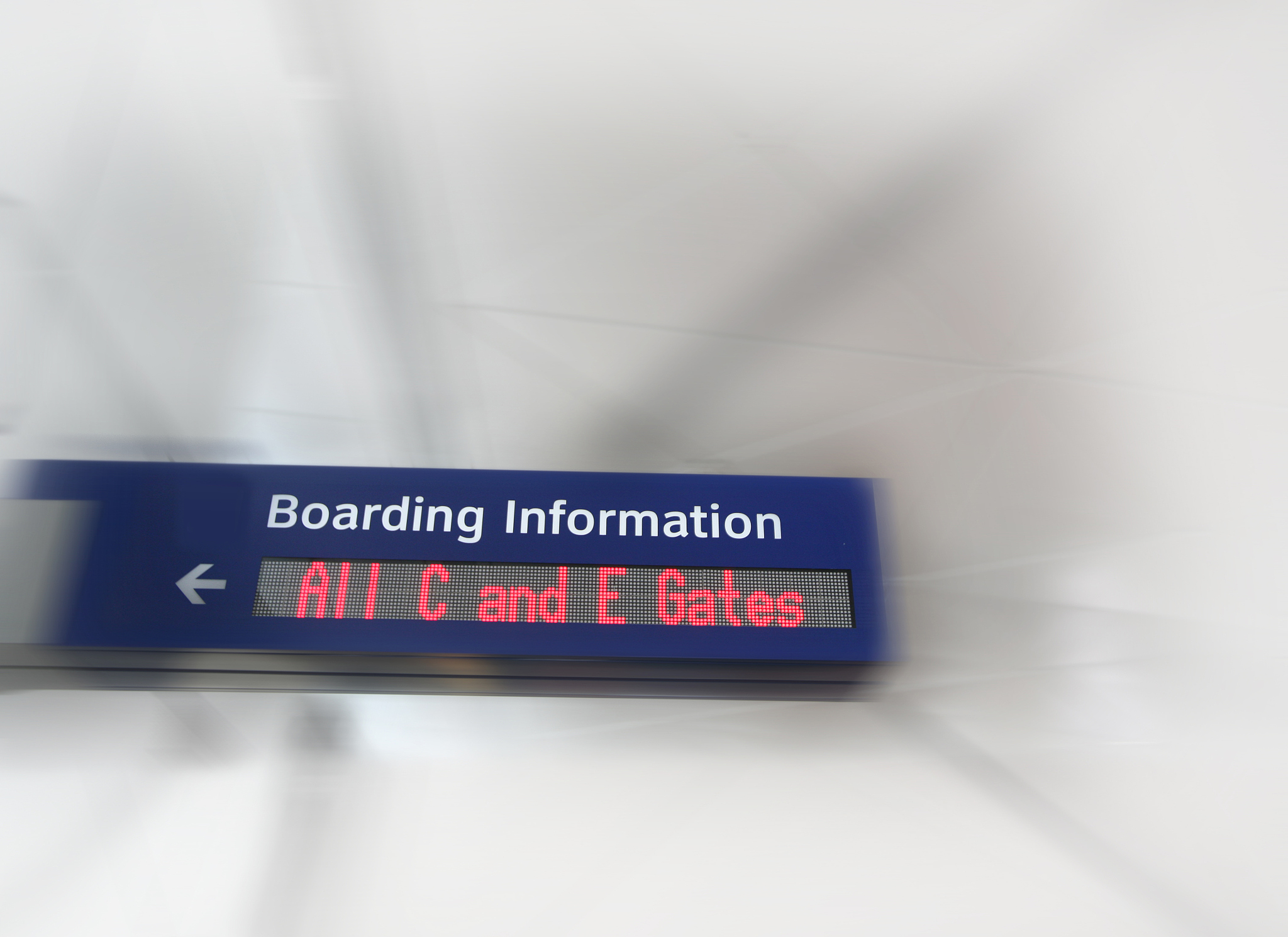 airport sign for boarding information