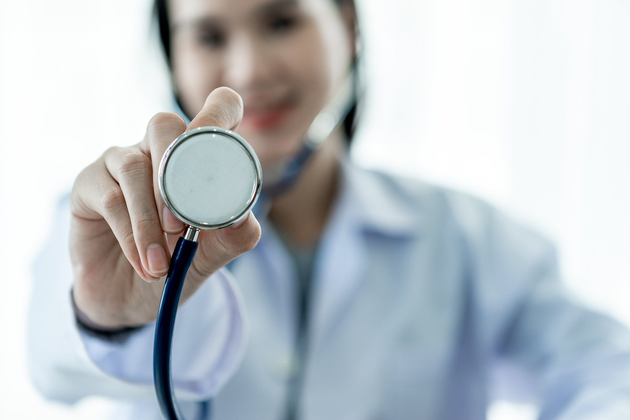 medical concept of asian female doctor in white coat with stetho