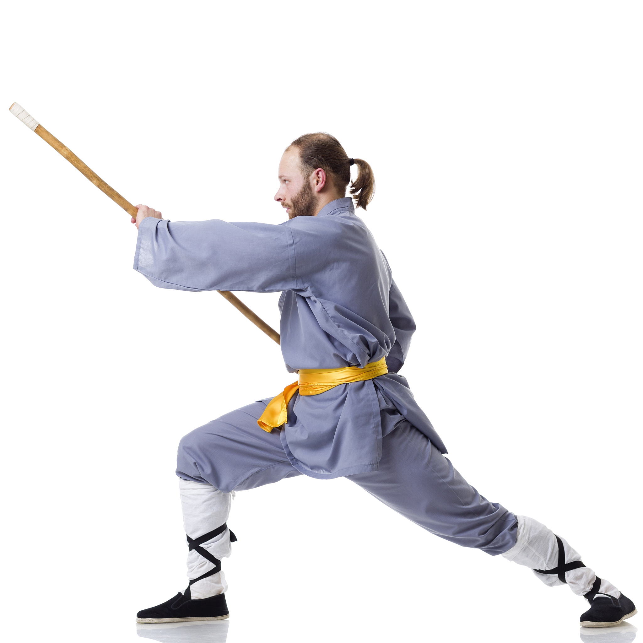 kung fu fighting position with wushu cudgel isolated on white