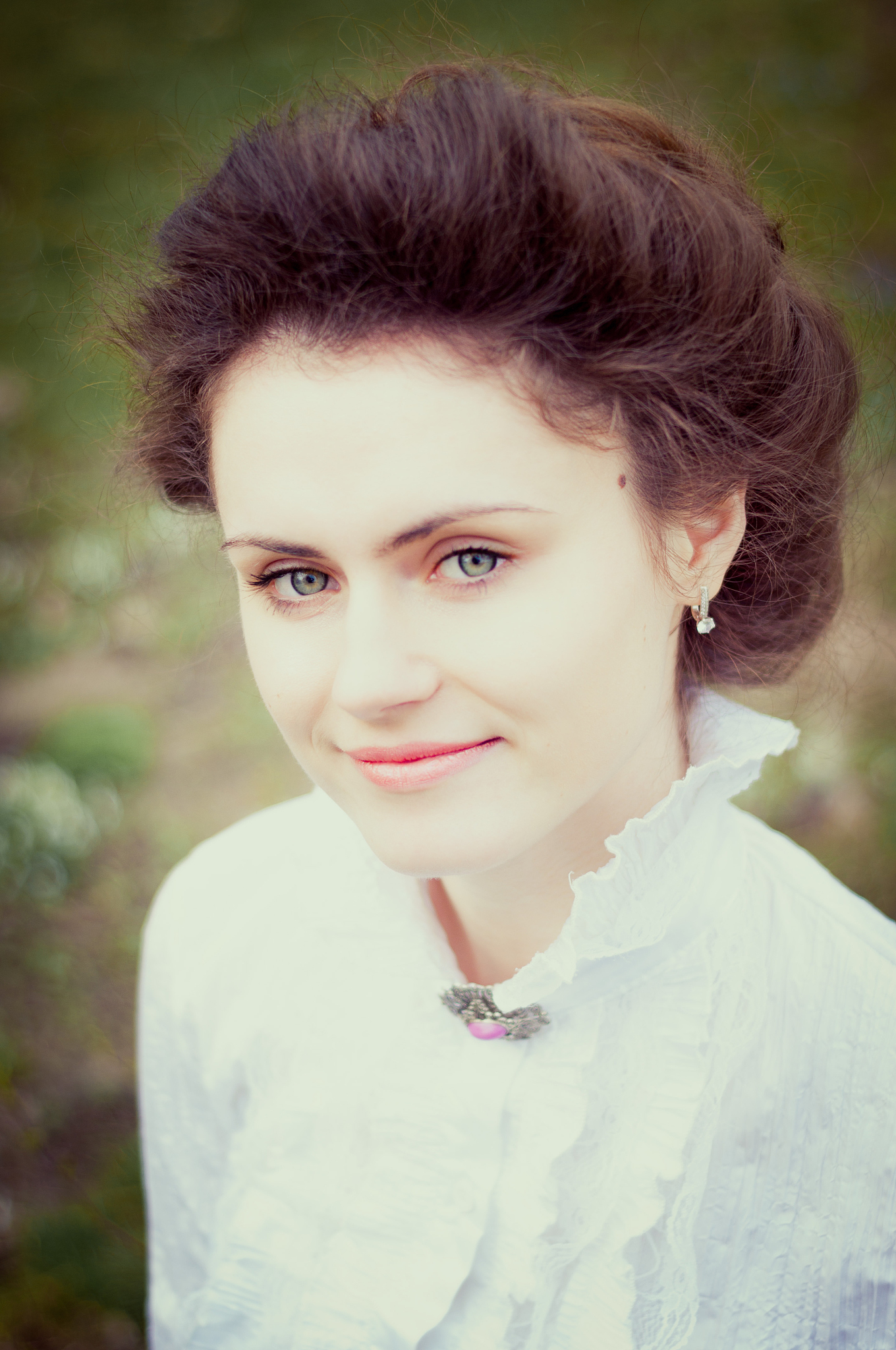 beautiful tender young woman with retro hairstyle