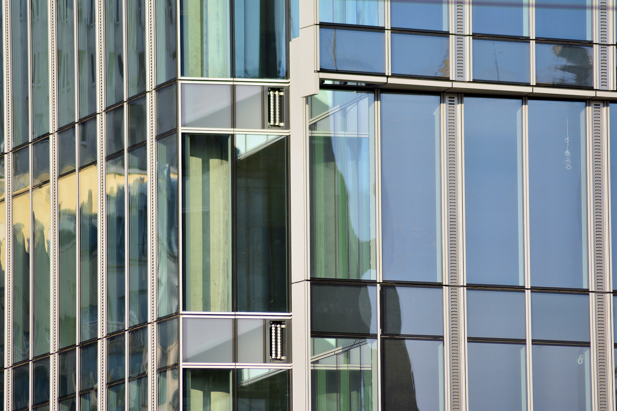 view of modern glass skyscraper,exterior of glass wall with abst