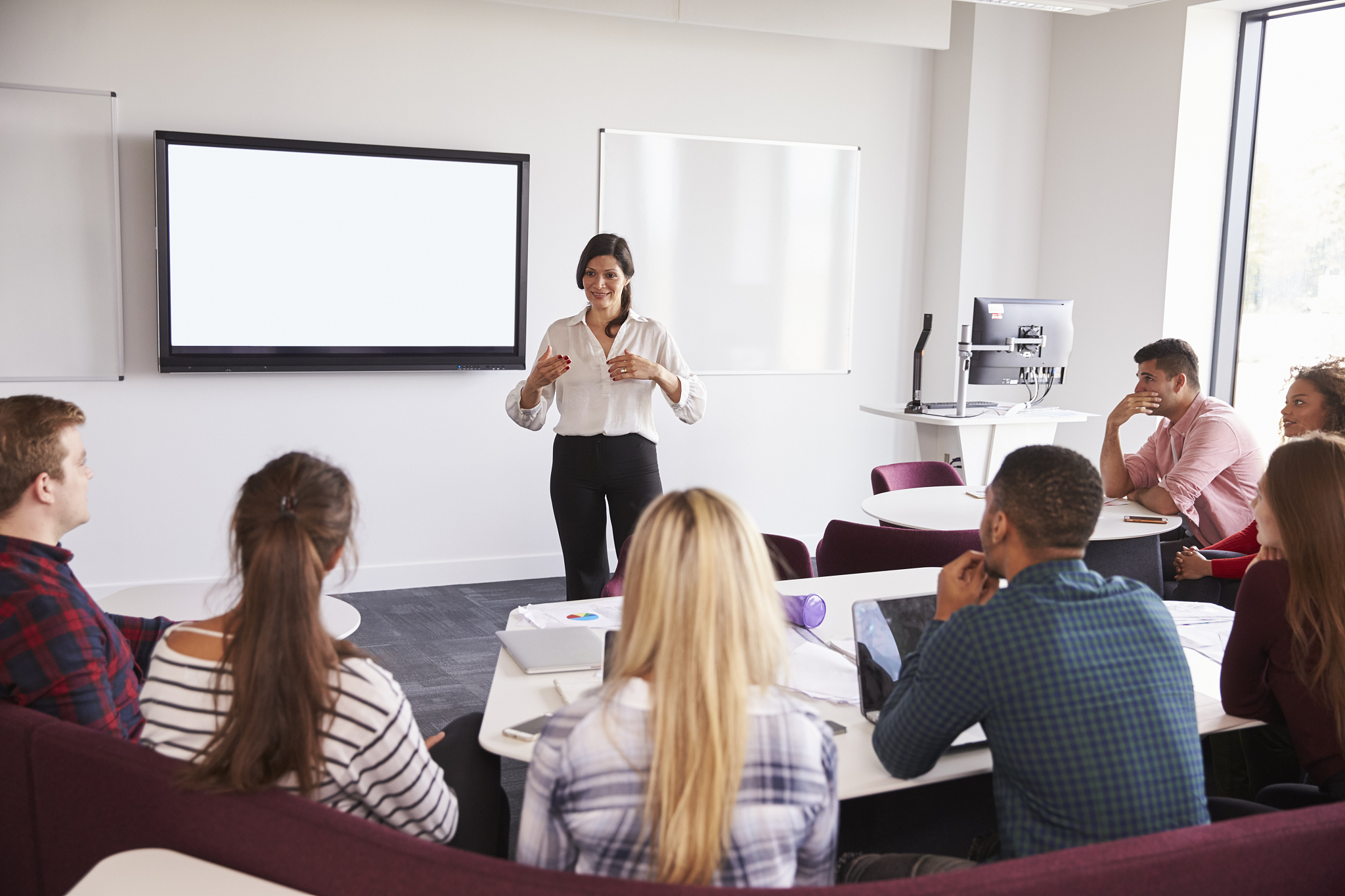 university students attending lecture on campus